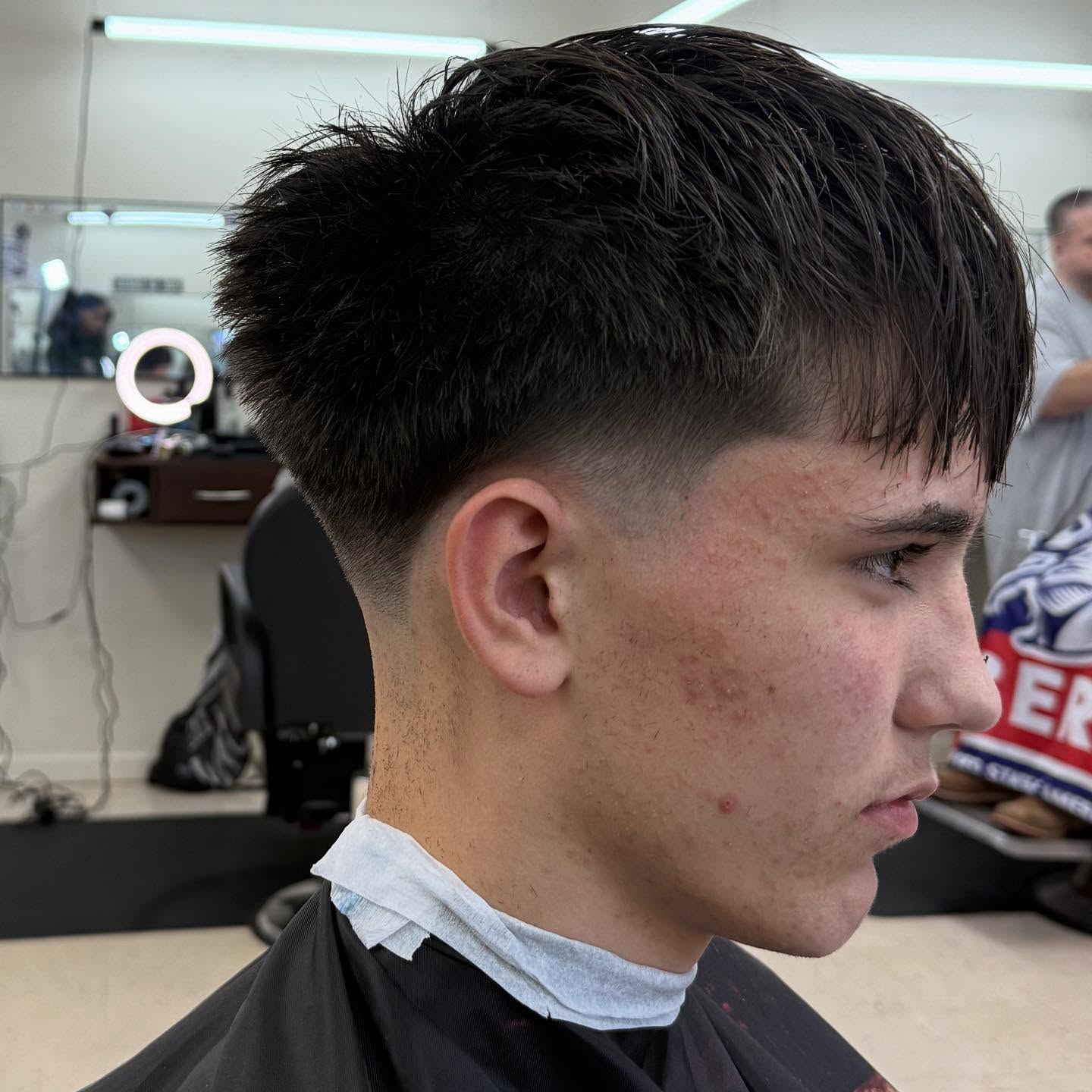 Textured Mid Taper Fade with Voluminous Top