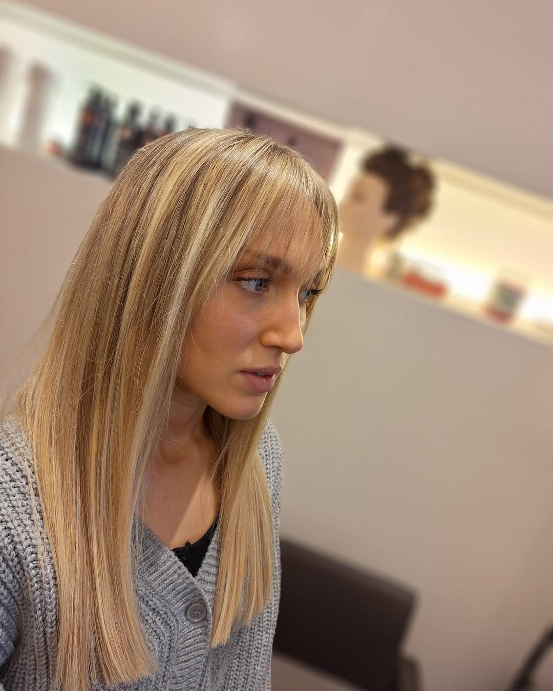 Chic Long Straight Hair with Subtle Face-Framing Bangs