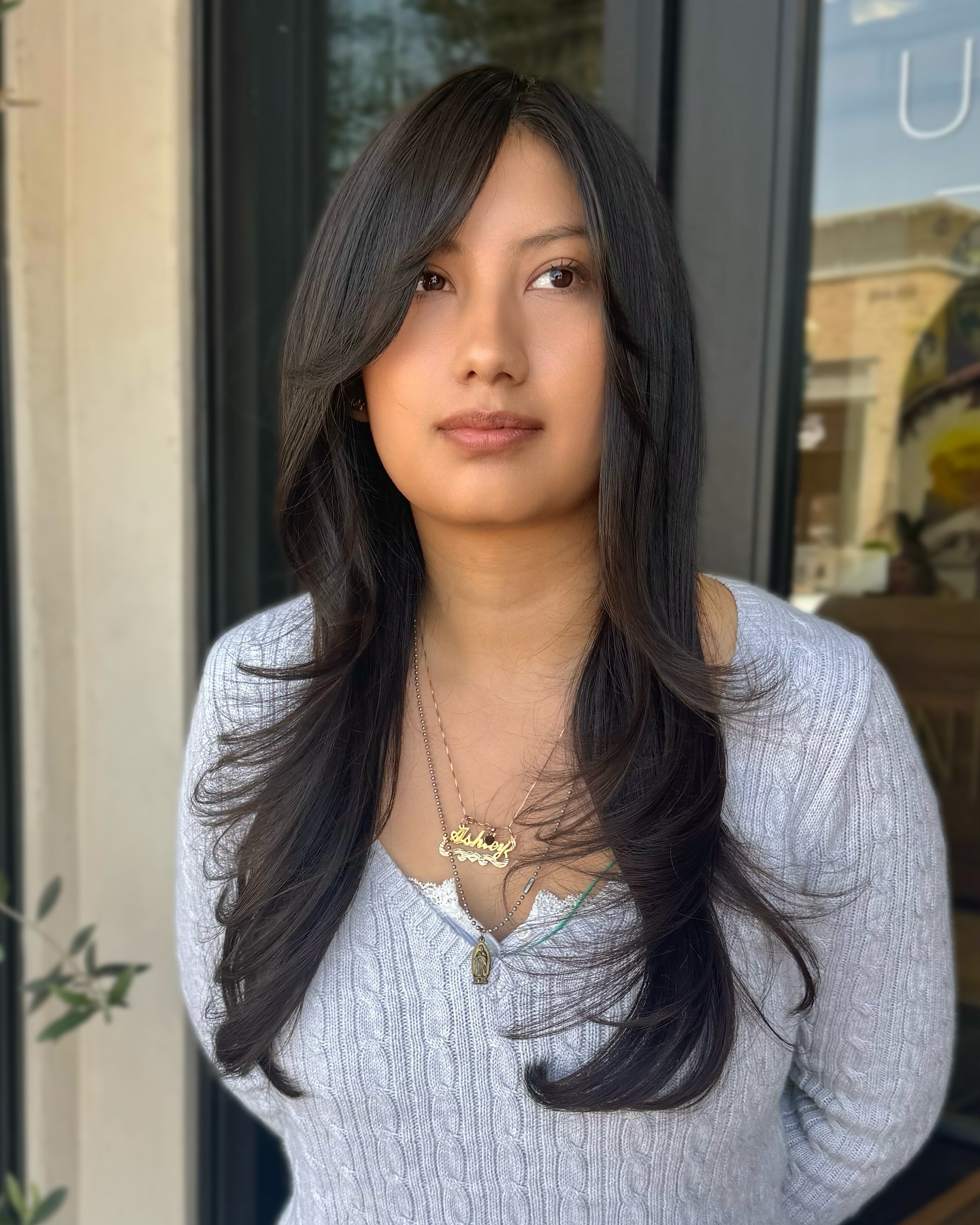 Classic Long Layers with Soft Face-Framing Bangs