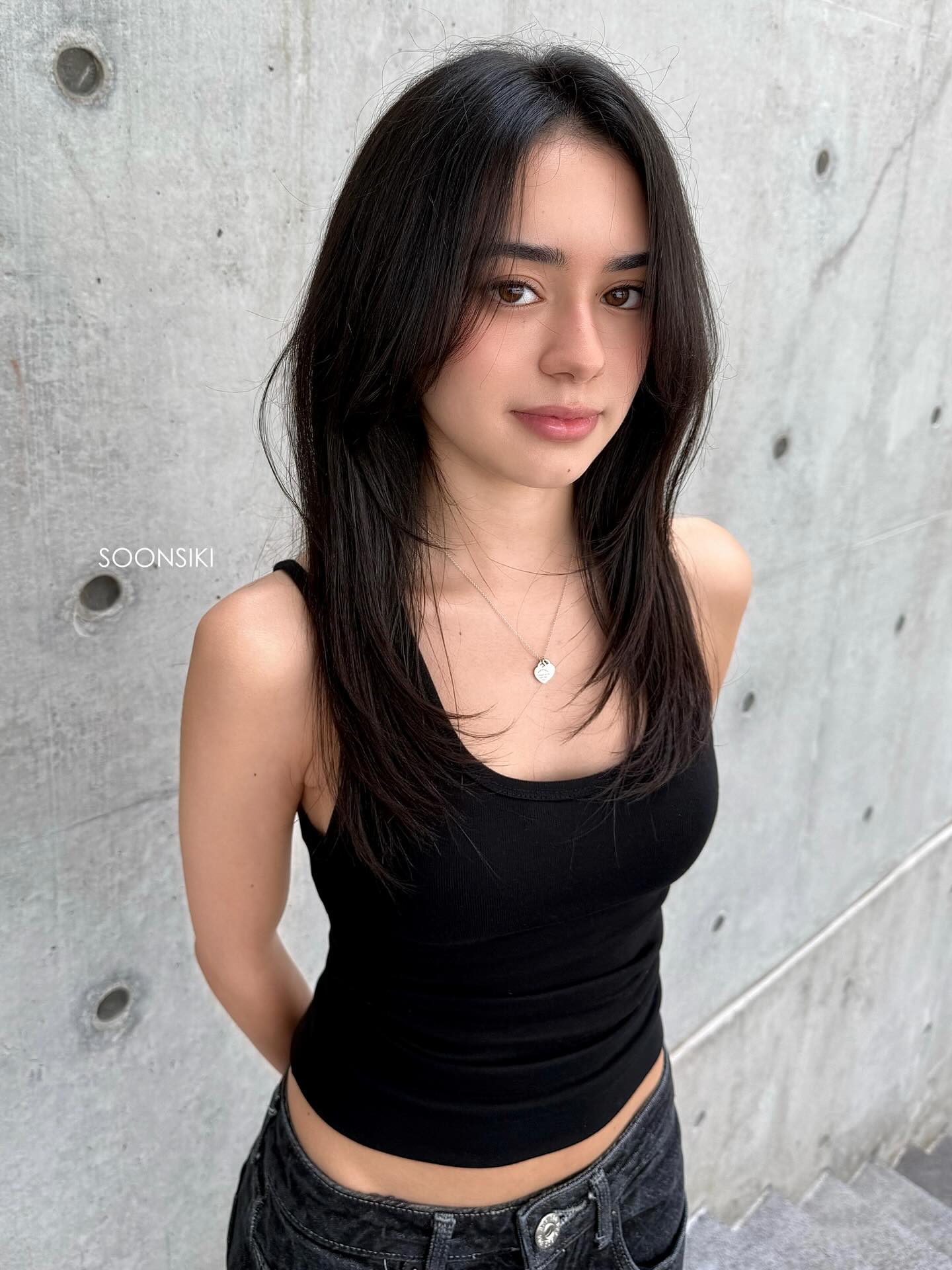 Effortlessly Chic Long Layered Cut with Soft Face Framing