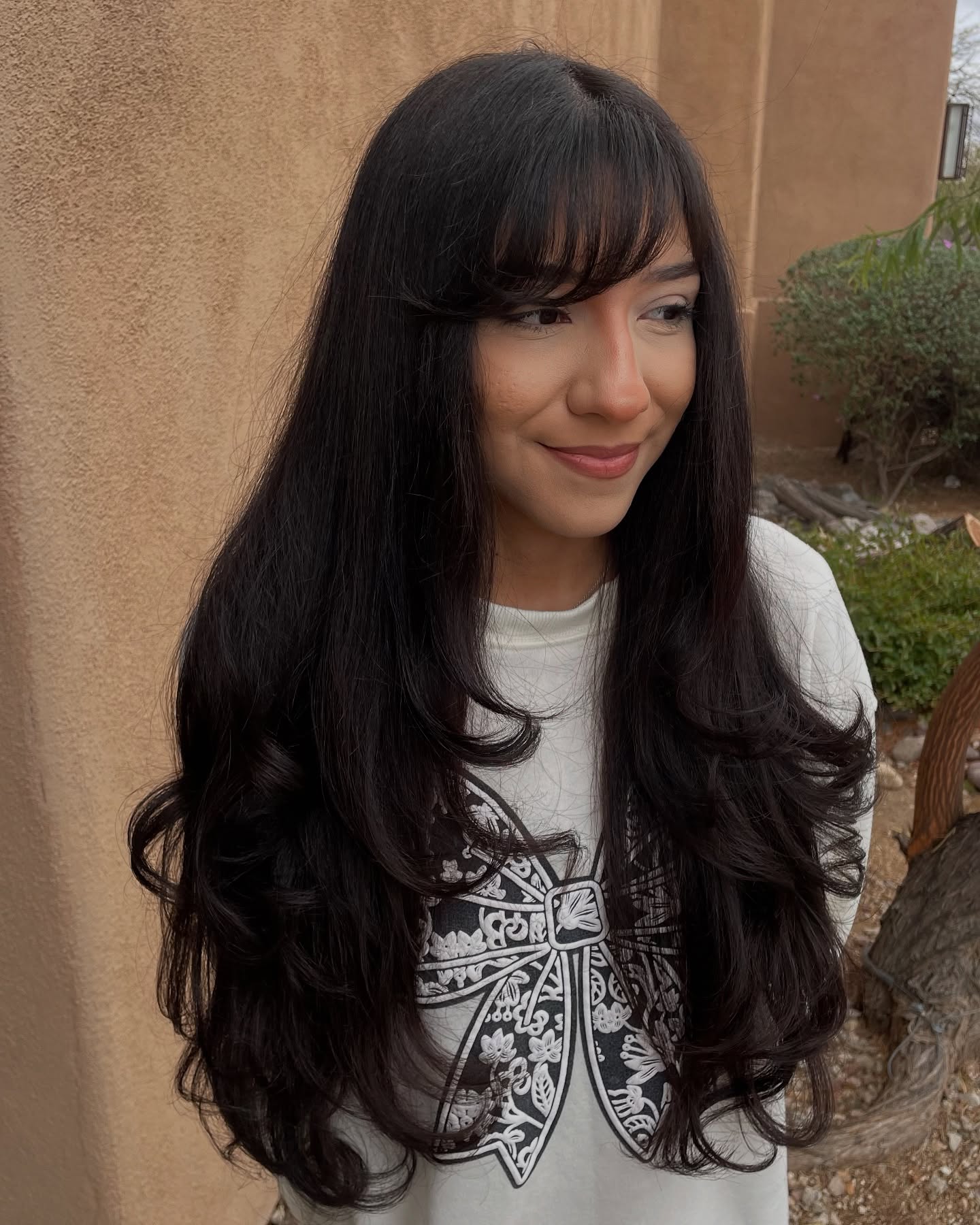 Long Layered Hair with Soft Wispy Bangs