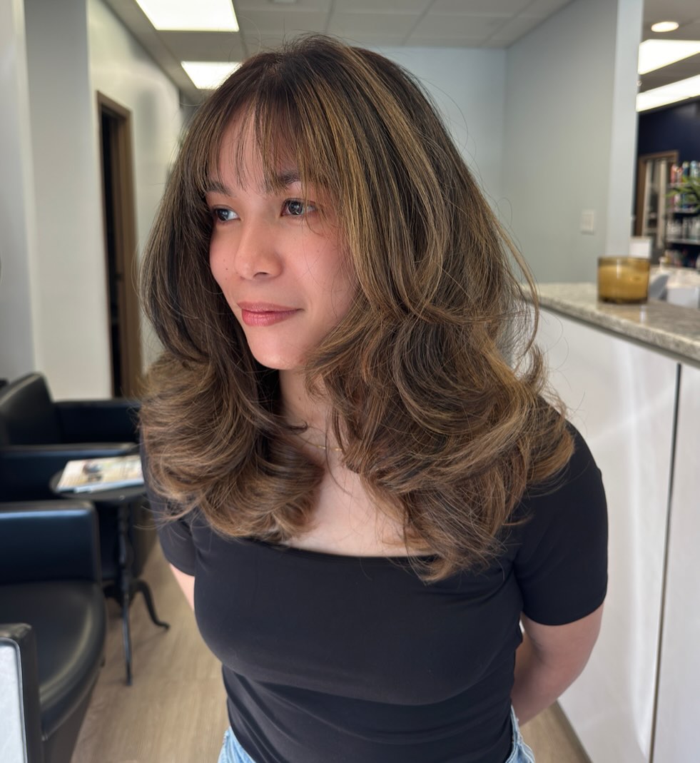 Voluminous Layered Hair with Soft Fringe