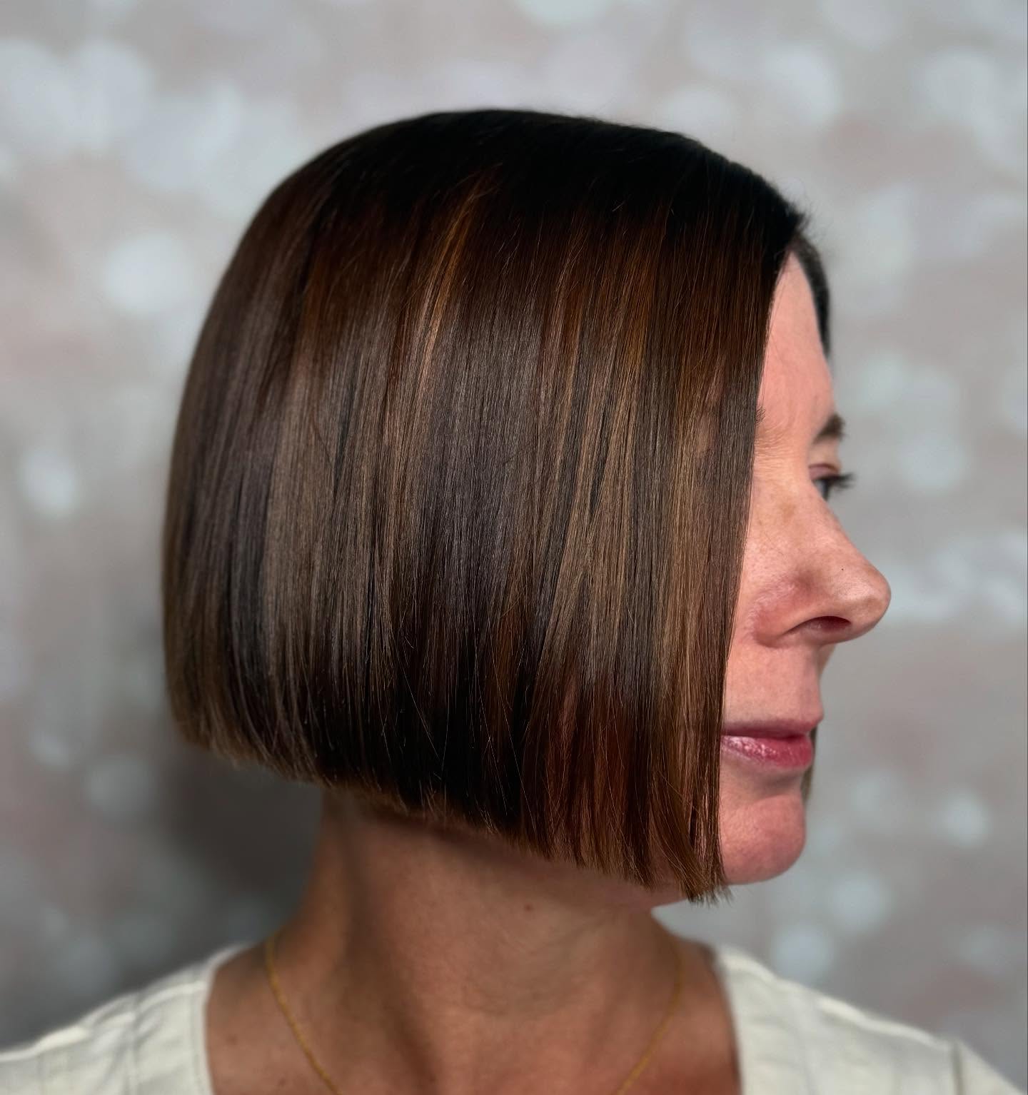 Chic Angular Bob with Warm Highlights