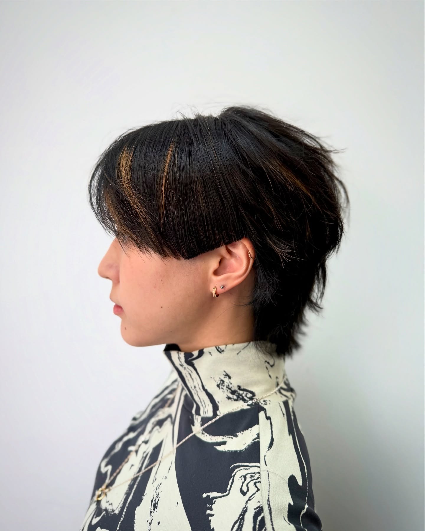 Chic Asymmetrical Mullet with Subtle Highlights