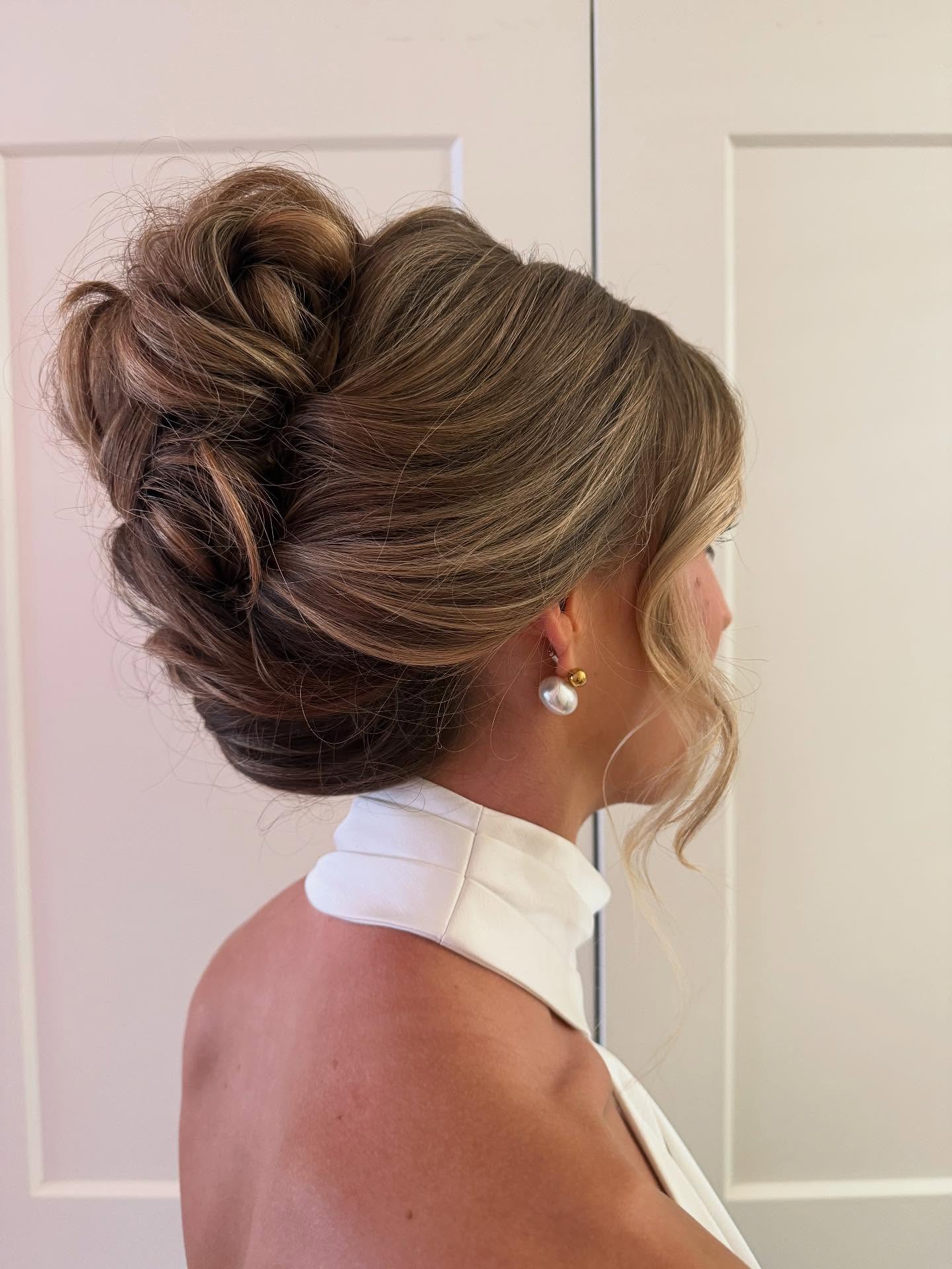 Chic Textured Updo with Soft Tendrils
