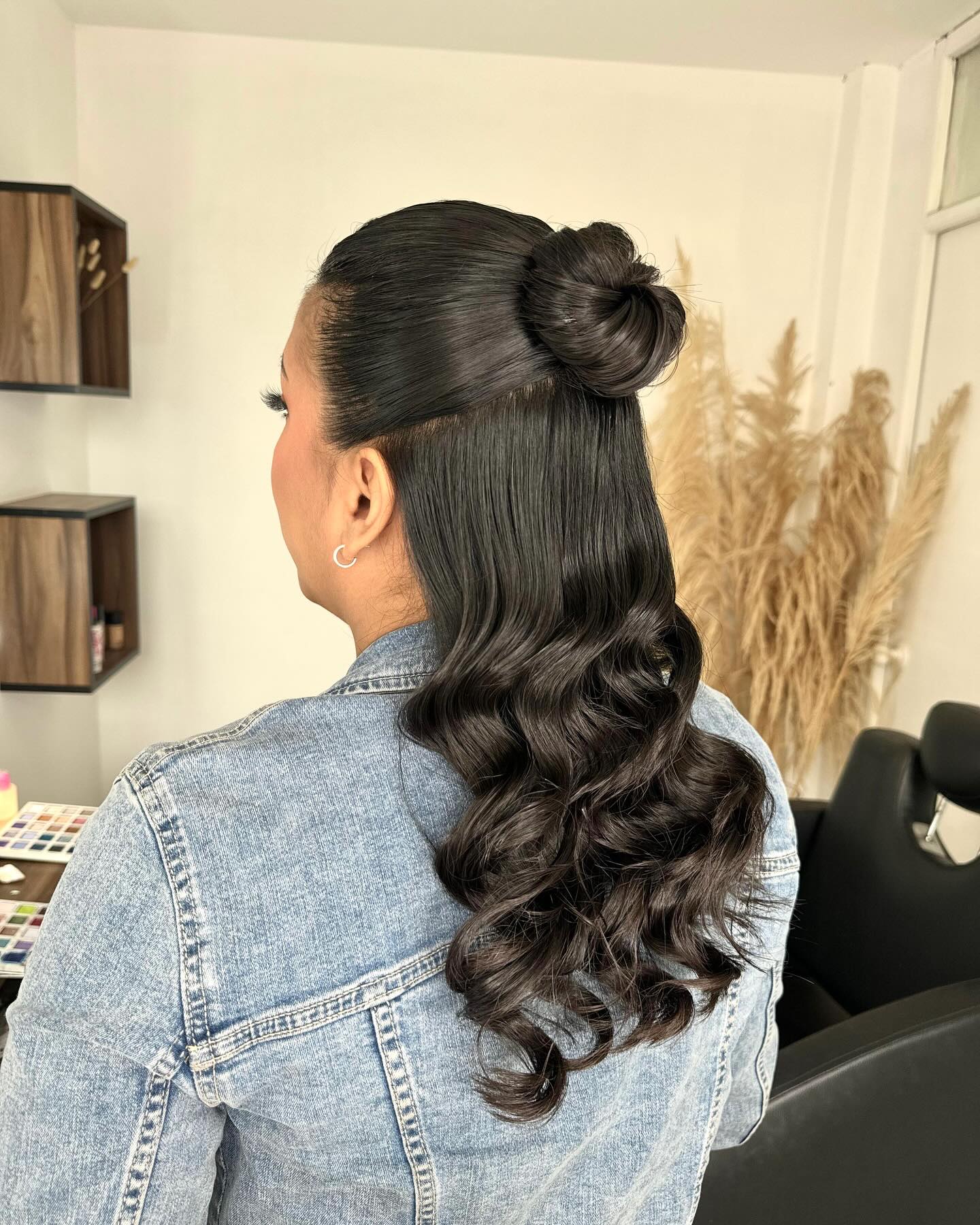 Chic Twisted Half-Up Bun with Loose Curls