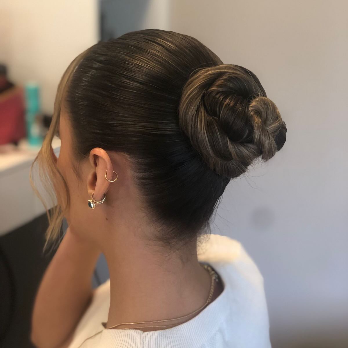 Elegant Twisted Bun with Subtle Highlights