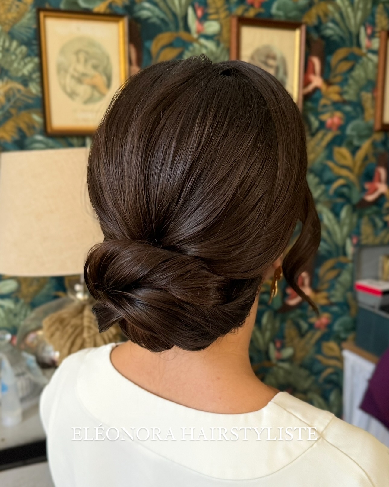 Elegant Twisted Low Bun with Soft Waves