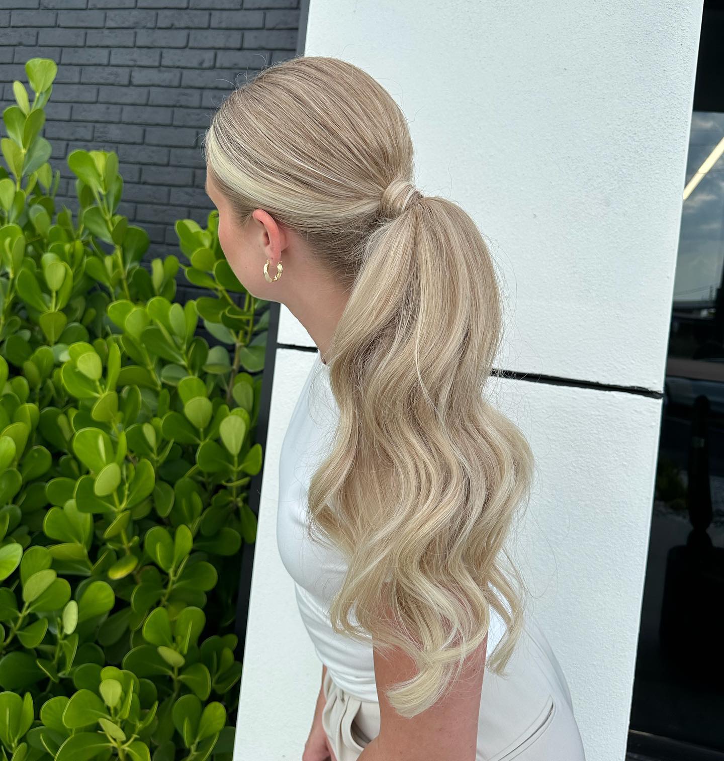 Glamorous Textured Low Ponytail with Soft Waves