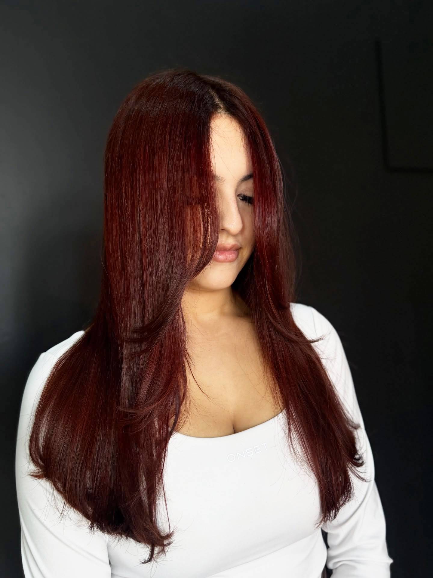 Glossy Deep Burgundy Long Layers with Face-Framing Highlights