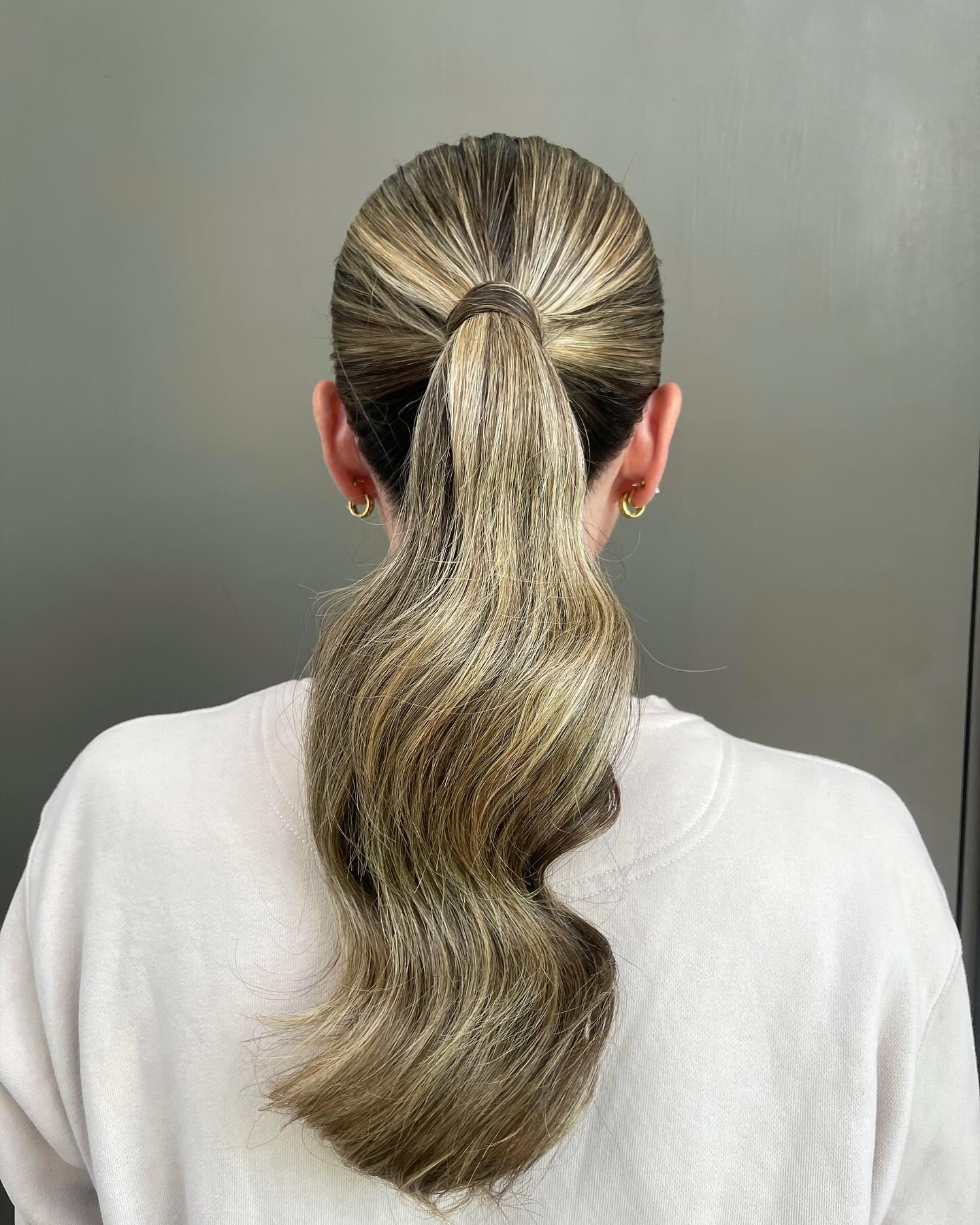 Polished Low Ponytail with Soft Waves