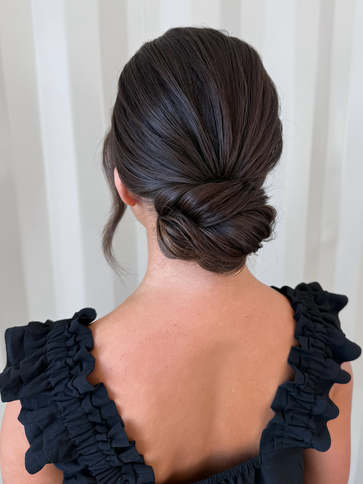 Sleek and Elegant Low Chignon