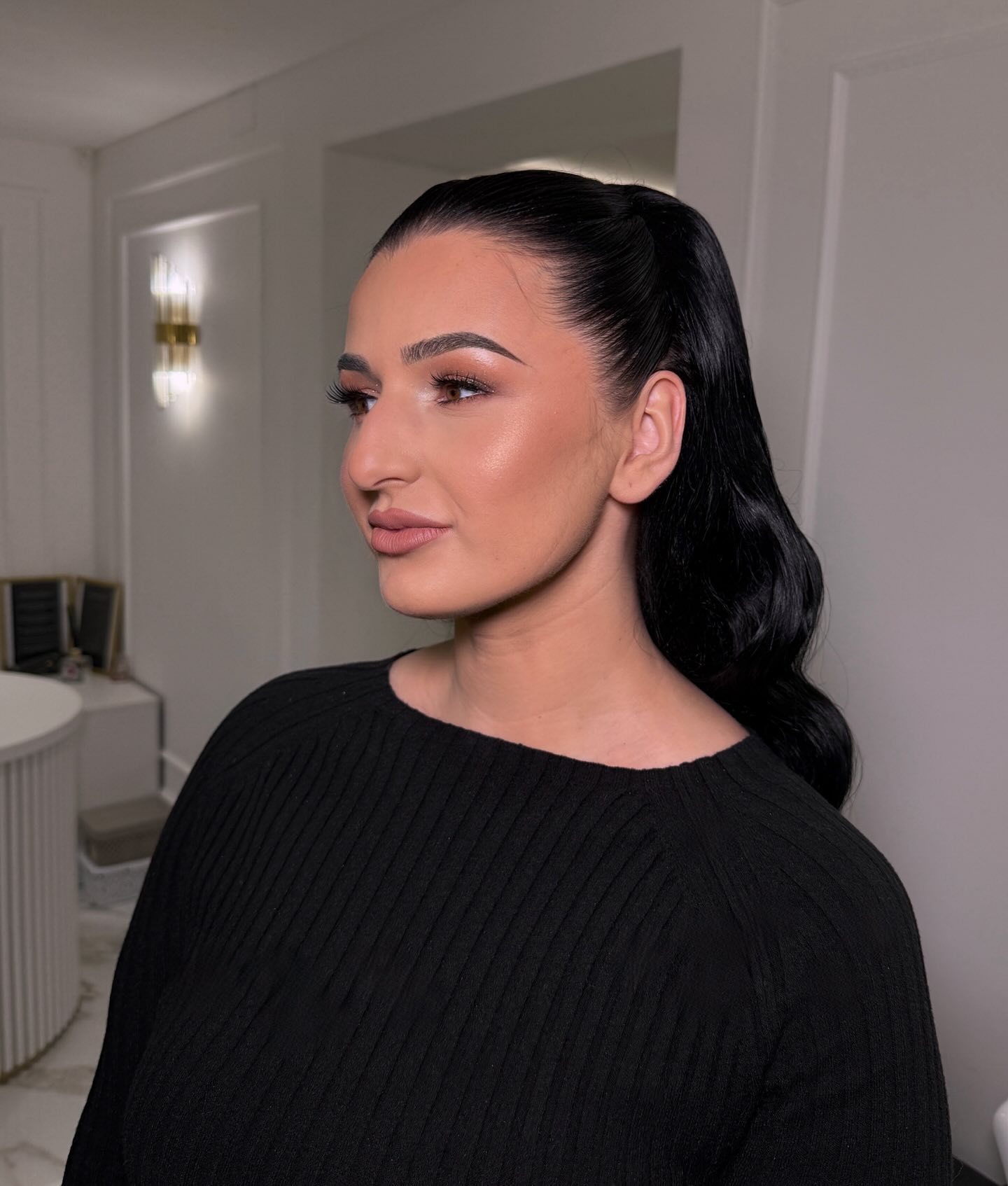 Sleek Textured Ponytail with Subtle Waves