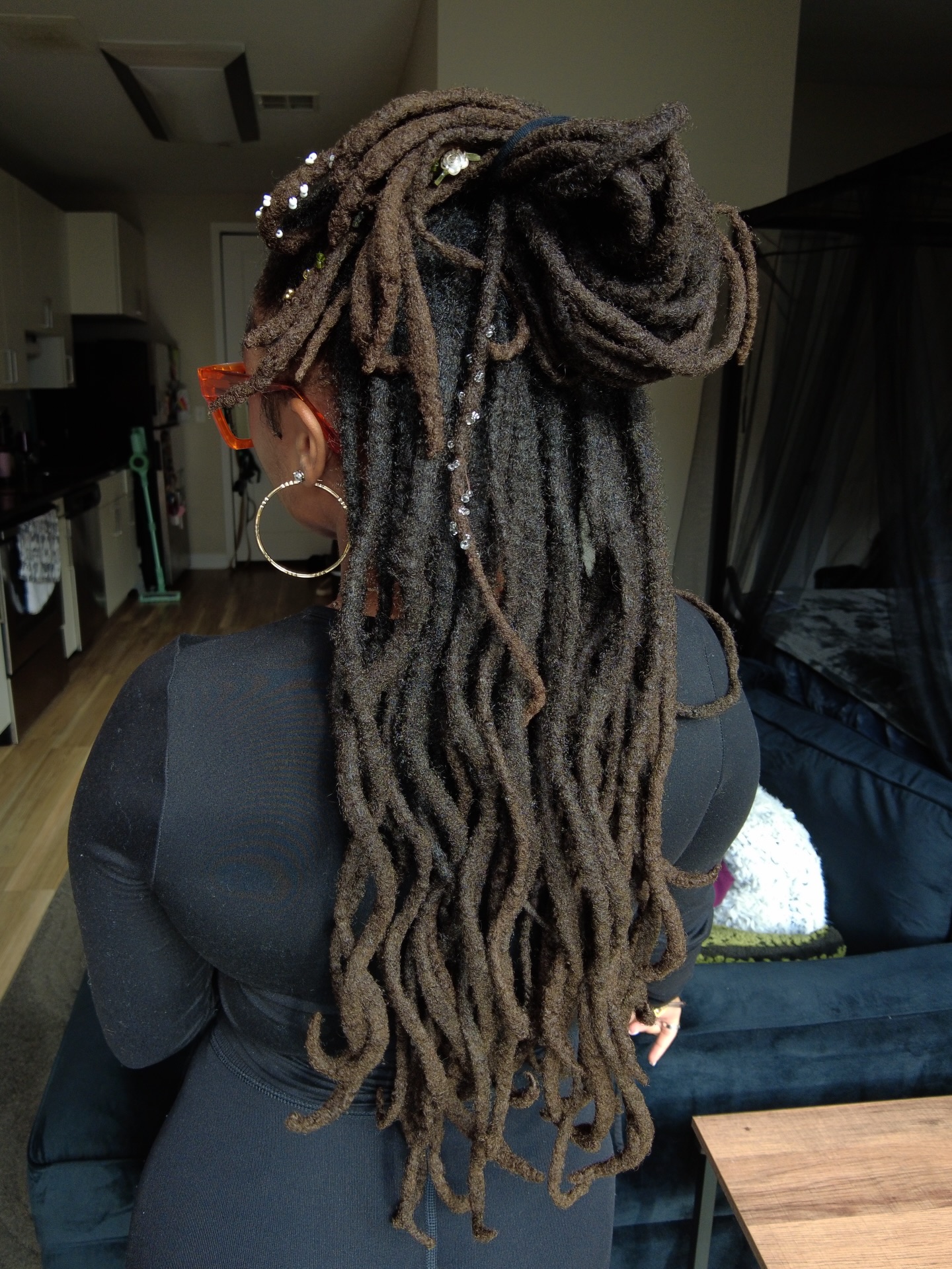 Elegant Twisted Dreadlocks with Decorative Accents