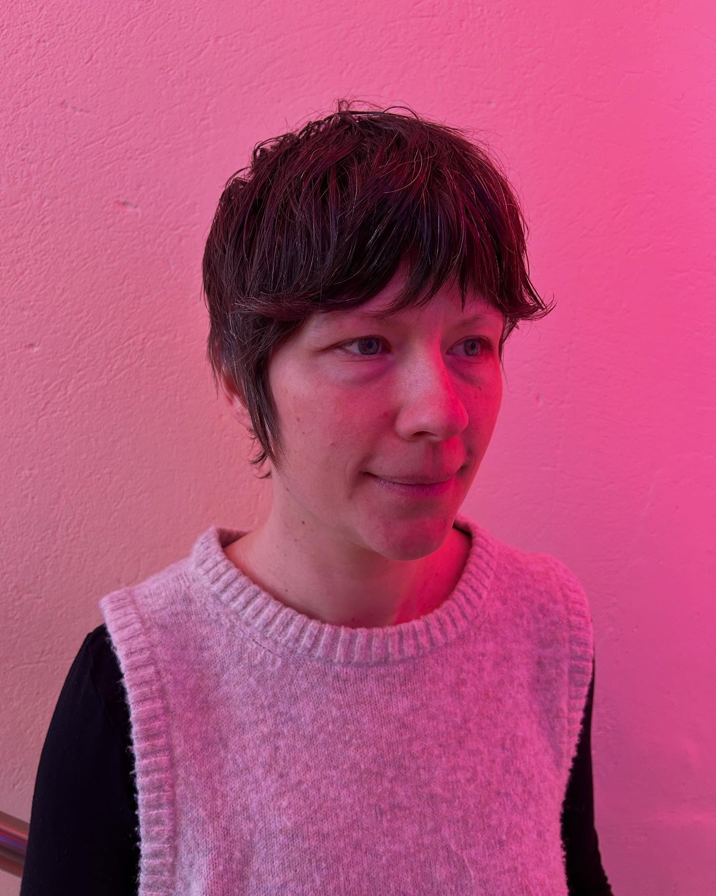 Modern Textured Pixie Cut with Playful Bangs