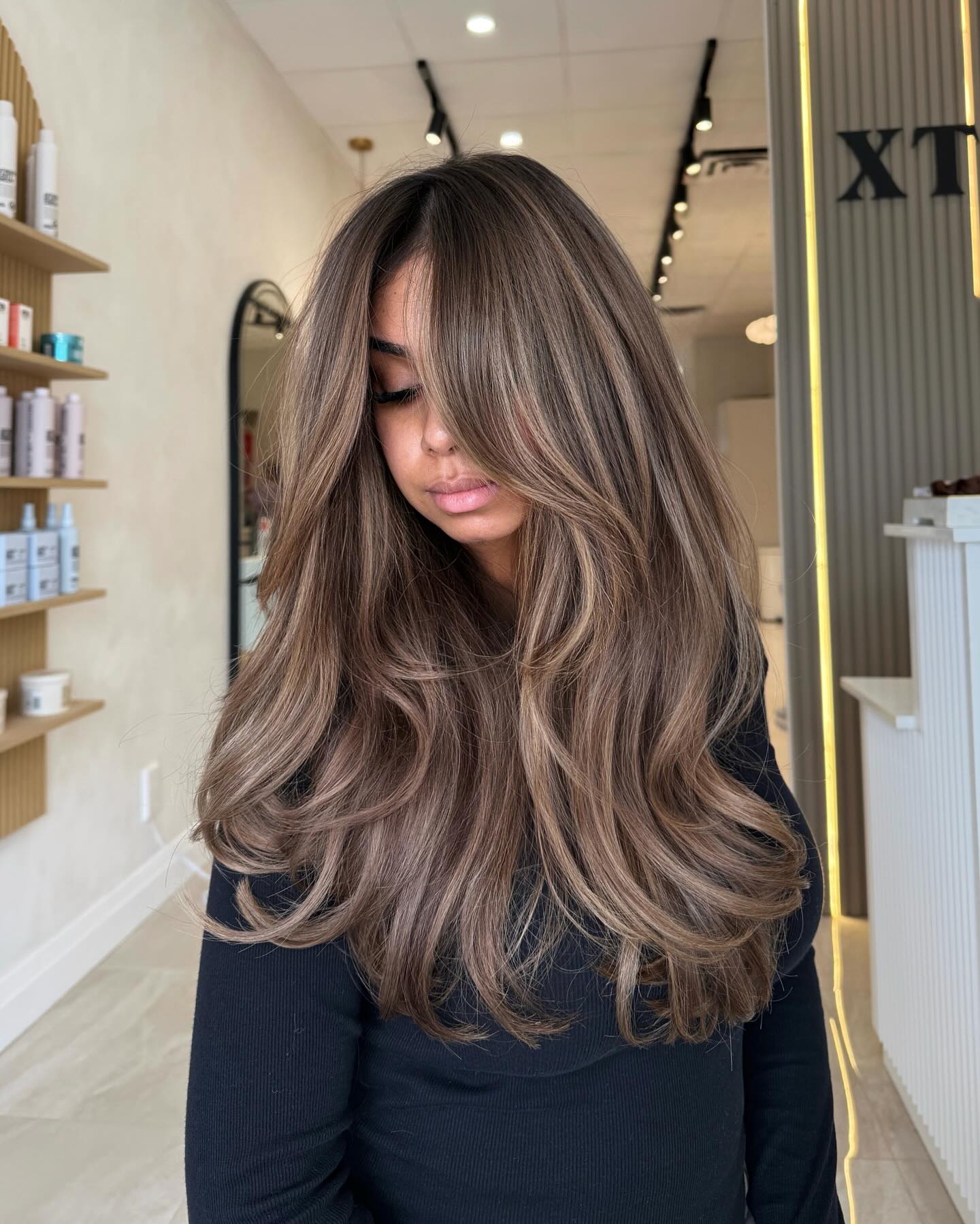 Radiant Long Layered Waves with Balayage Highlights