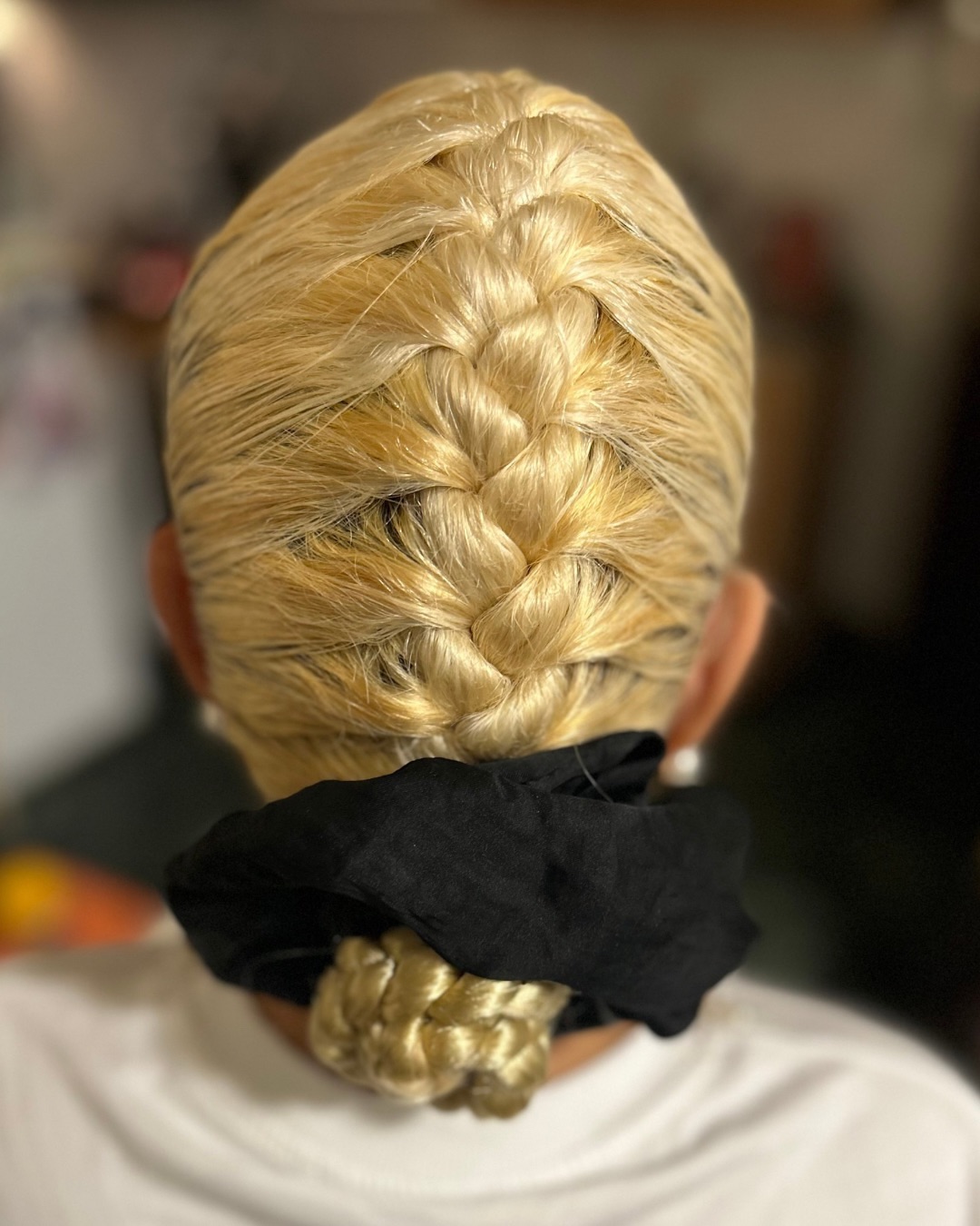 Sleek High Braid with a Chic Scrunchie