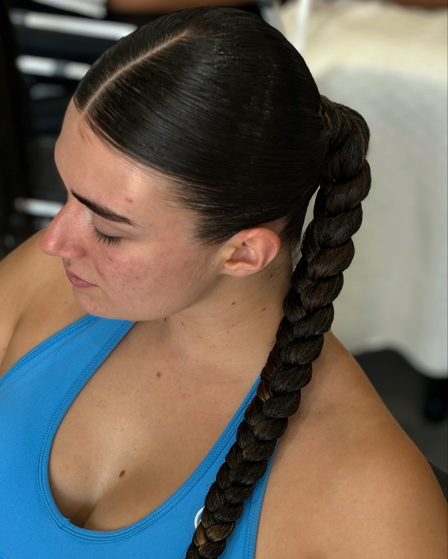 Sleek High Ponytail Braid with Glossy Finish