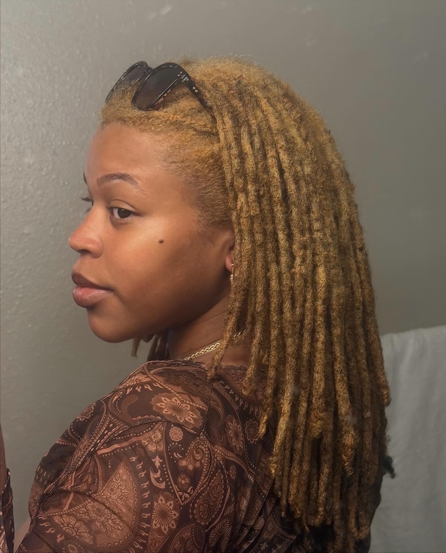 Stylish Mid-Length Dreadlocks with Blonde Highlights