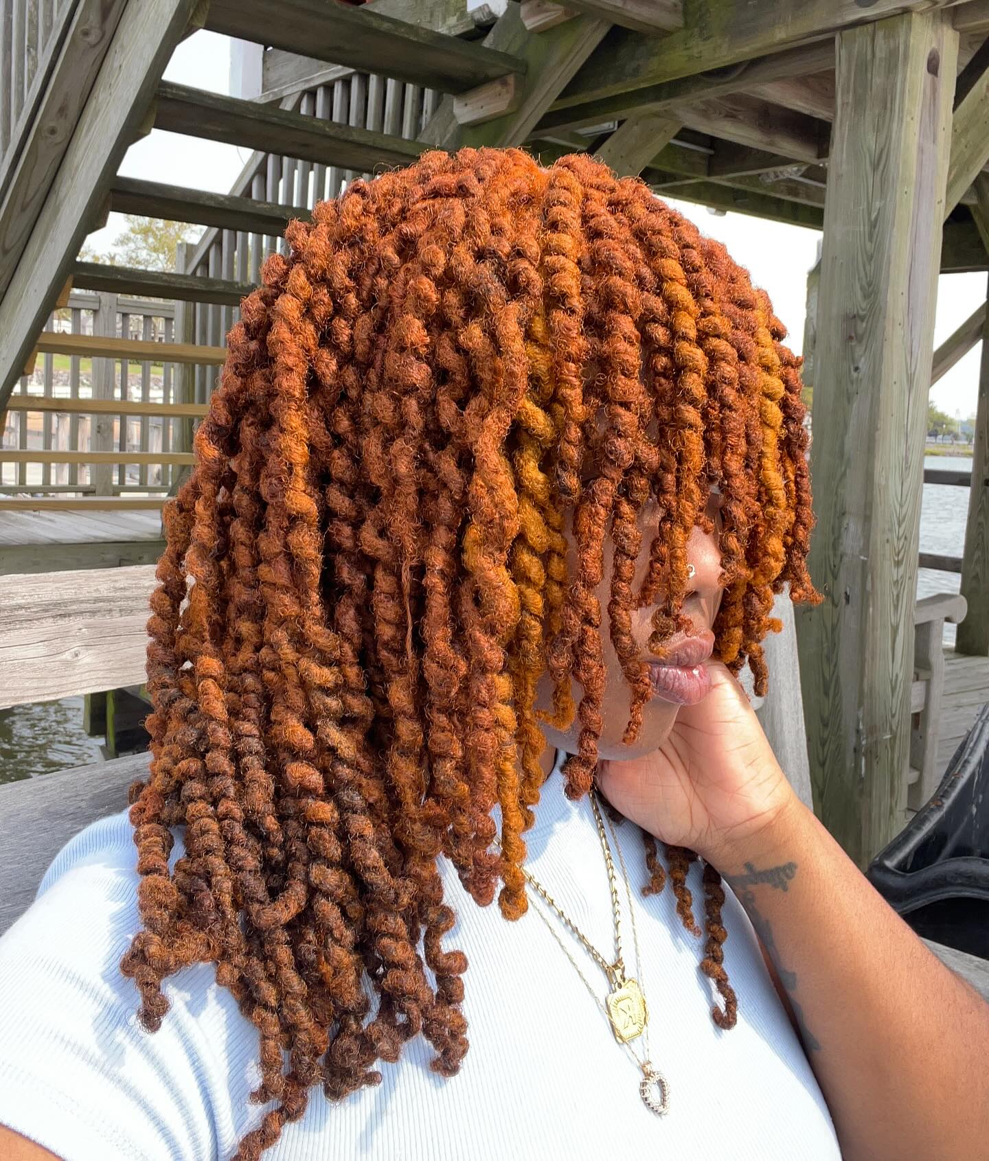 Textured Shoulder-Length Dreadlocks with Fiery Highlights