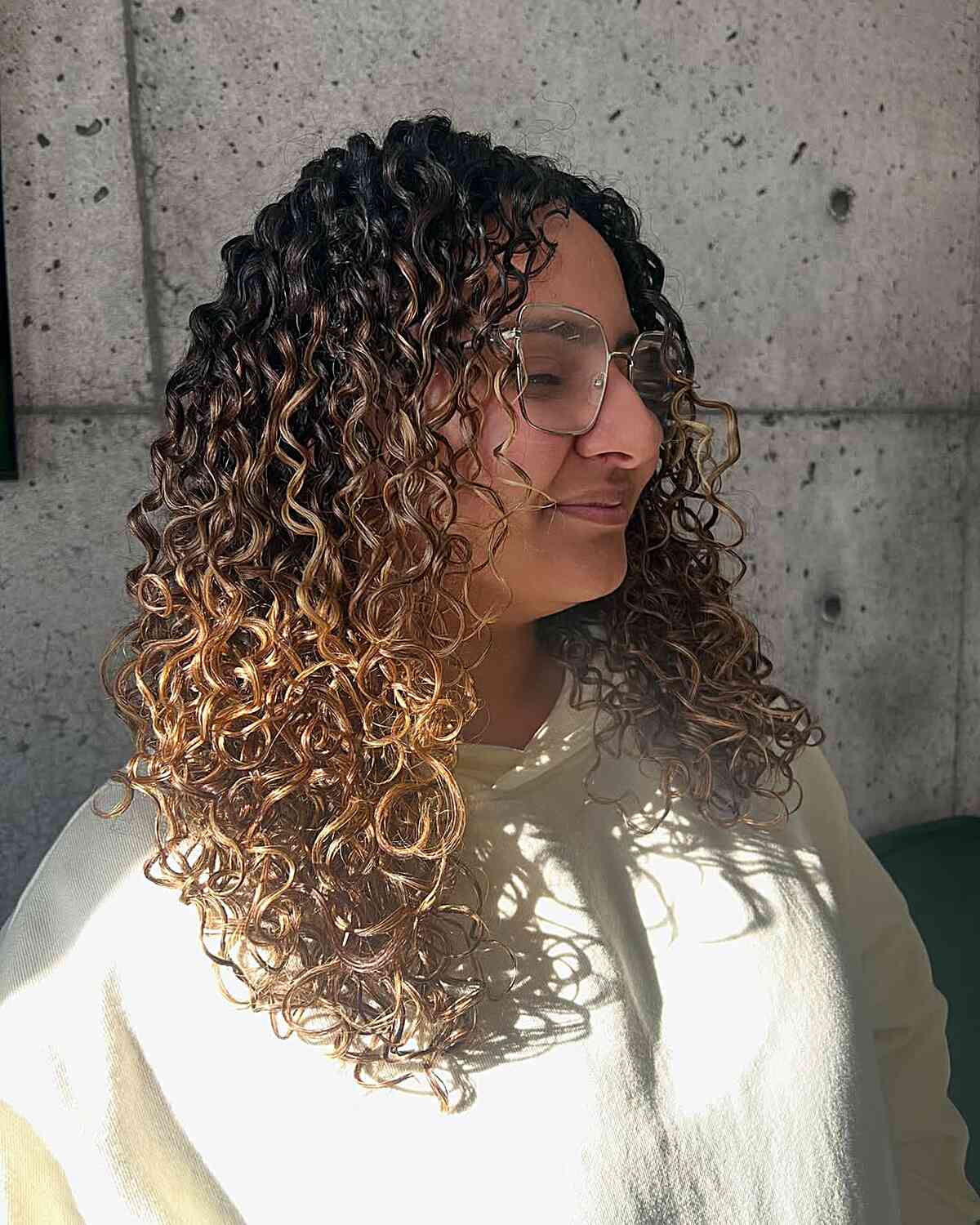 Vibrant Curly Shoulder-Length Hairstyle