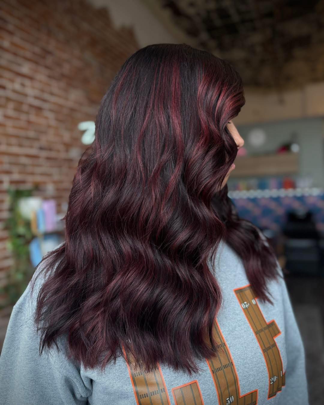 Rich Burgundy Waves with Subtle Dimension