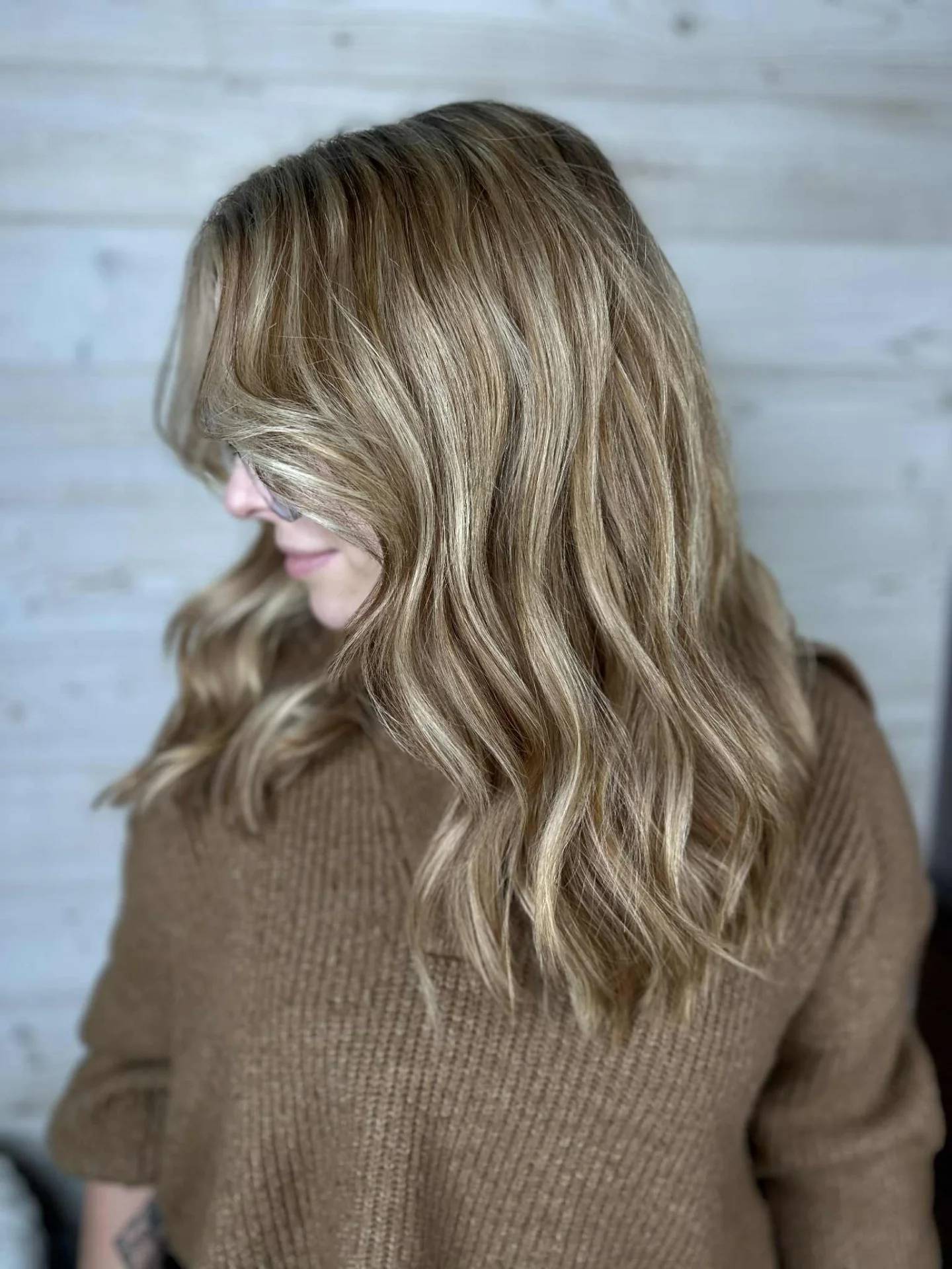 Soft Sandy Blonde Waves with Subtle Highlights