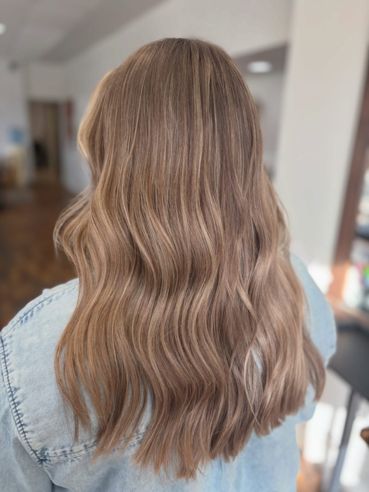 Warm Ashy Blonde Waves with Subtle Dimension