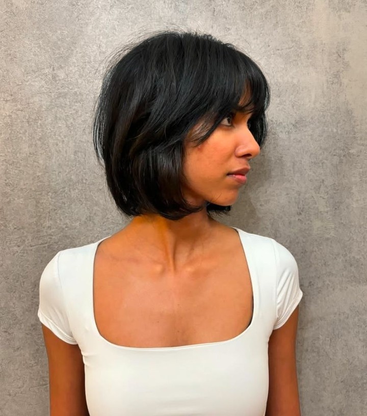 Modern Sleek Jet-Black Bob with Soft Angled Layers