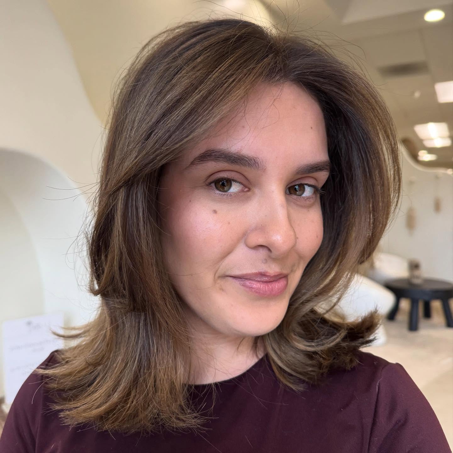 Softly Layered Shoulder-Length Cut with Subtle Highlights