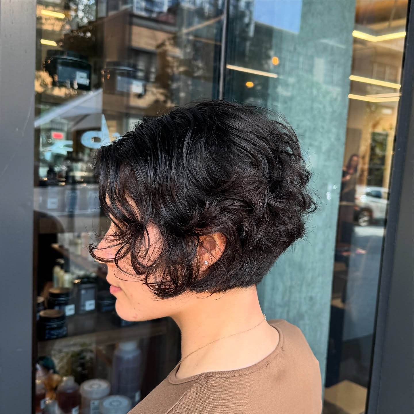 Textured Short Curly Cut with Defined Waves