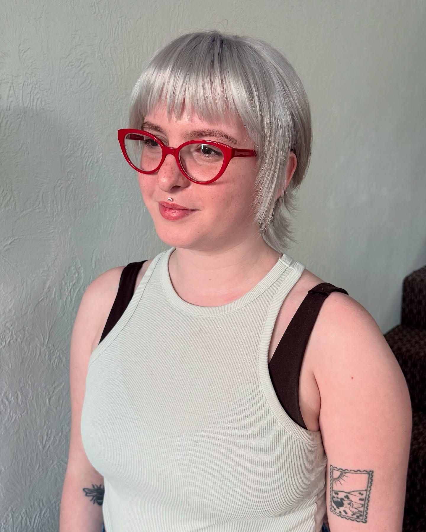 Trendy Textured Silver Bob with Soft Fringe
