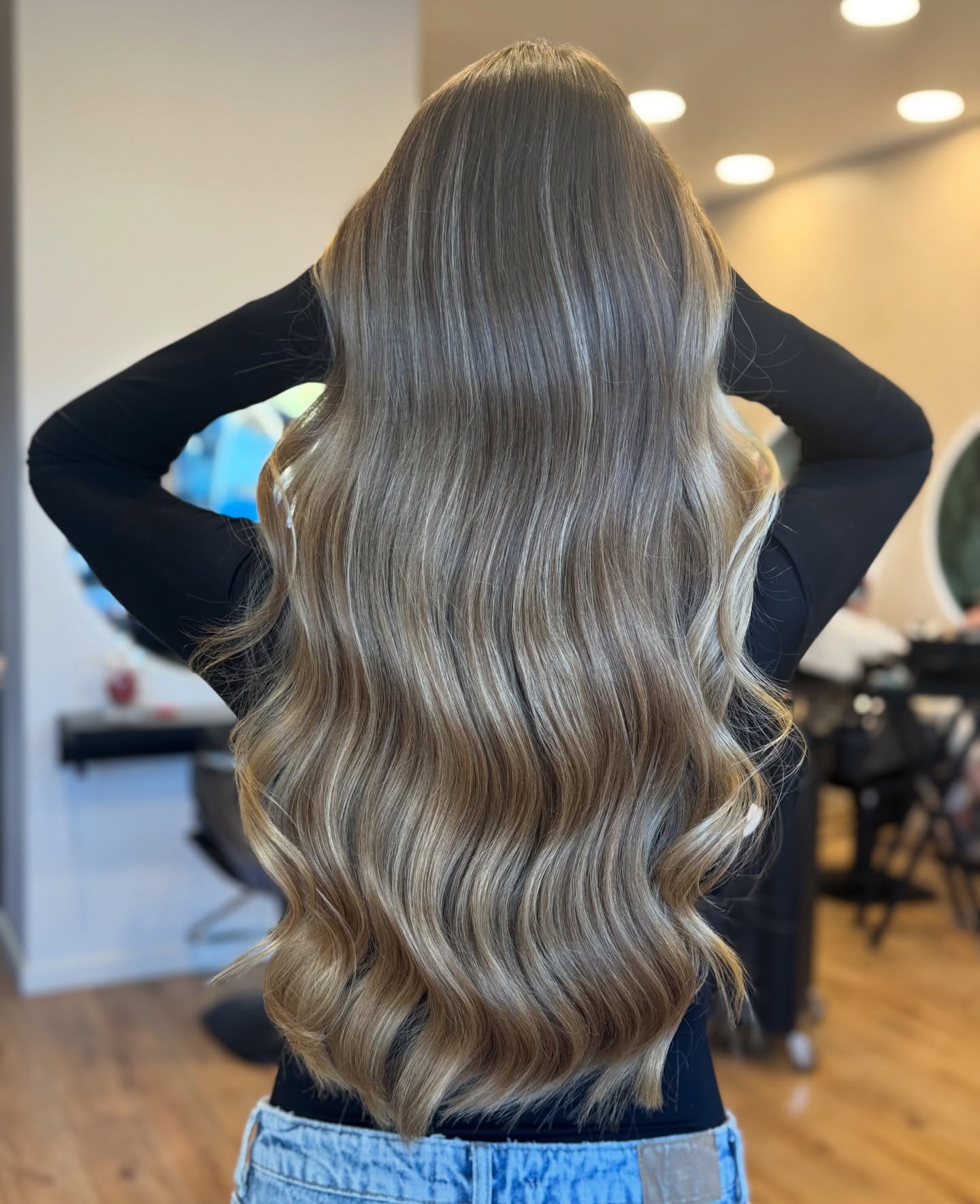 Luxurious Long Wavy Cut with Soft Highlights