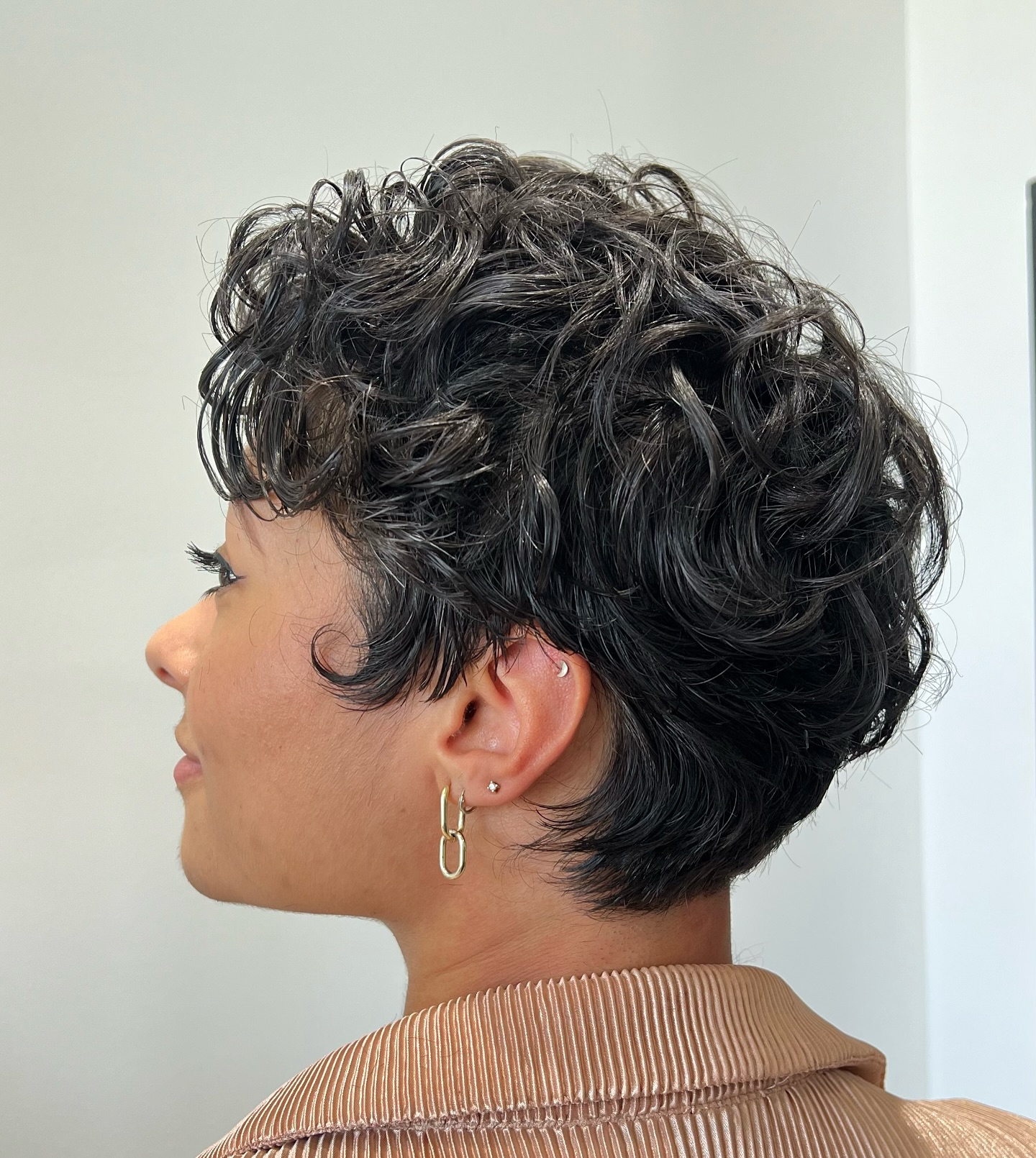 Chic Curly Pixie Cut with Textured Layers