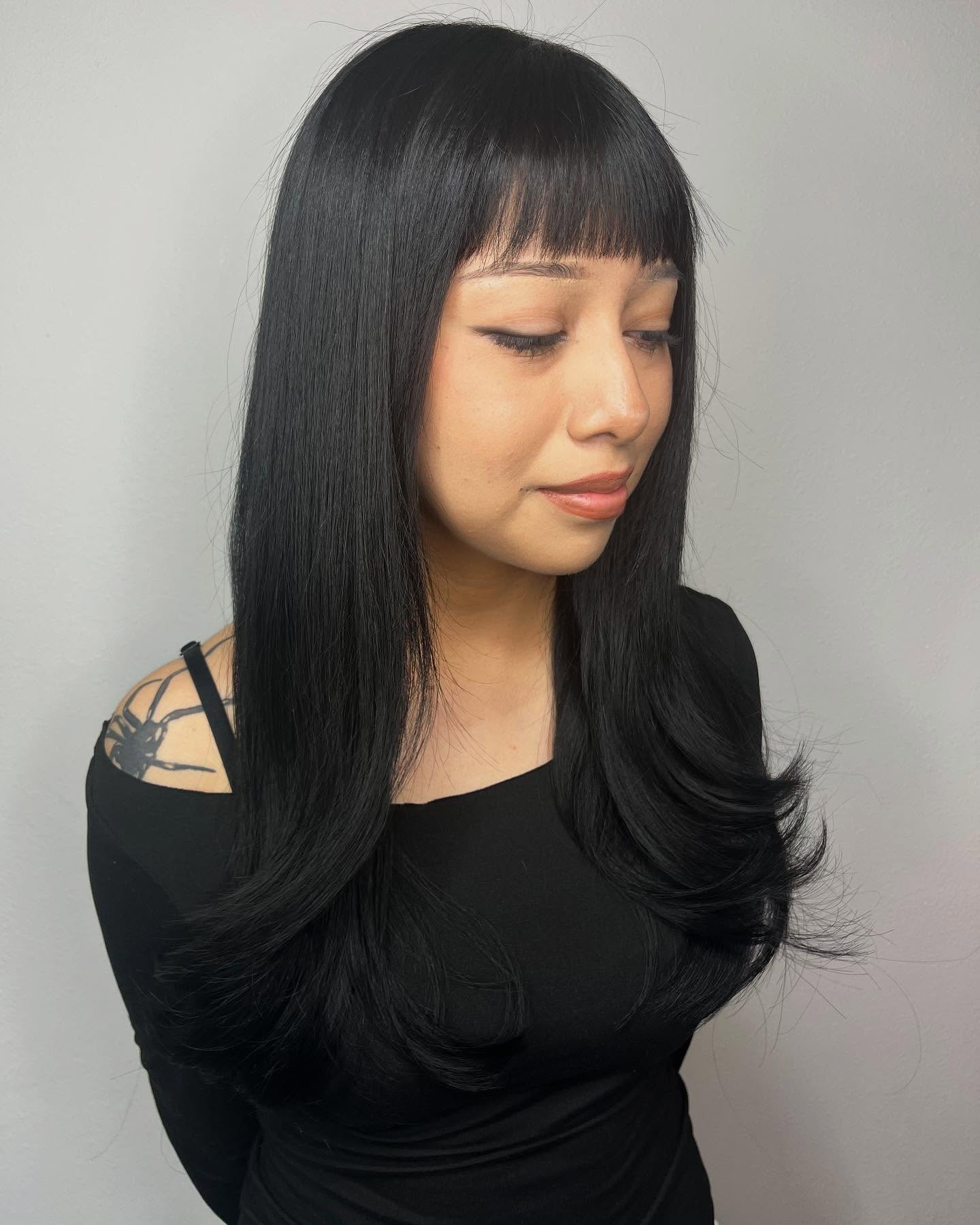 Chic Long Layered Cut with Blunt Bangs