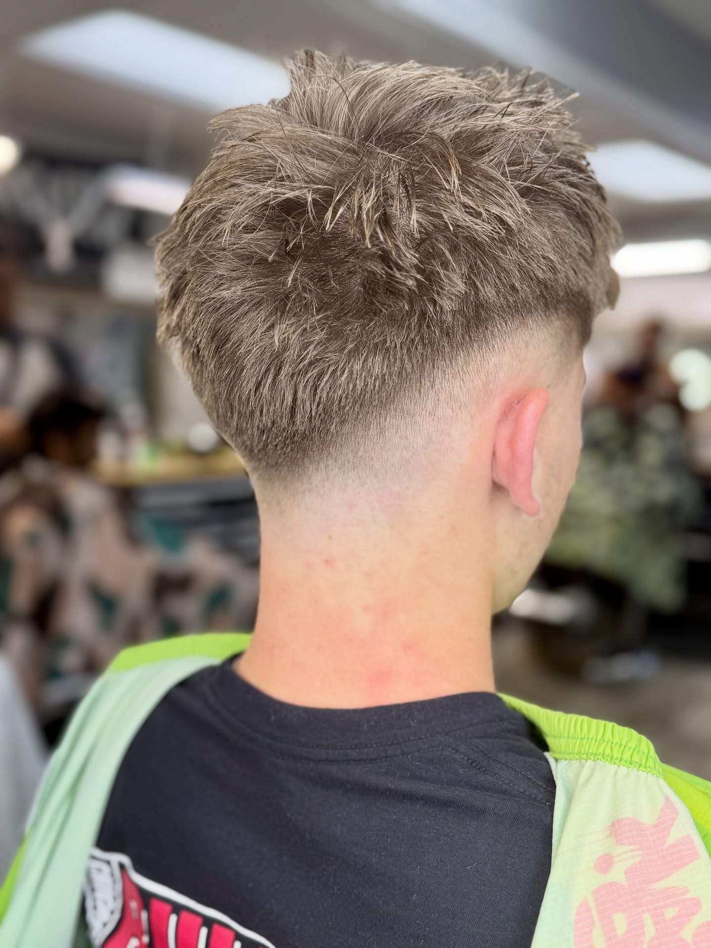 Choppy Textured Mid Drop Fade with Light Blonde Tips
