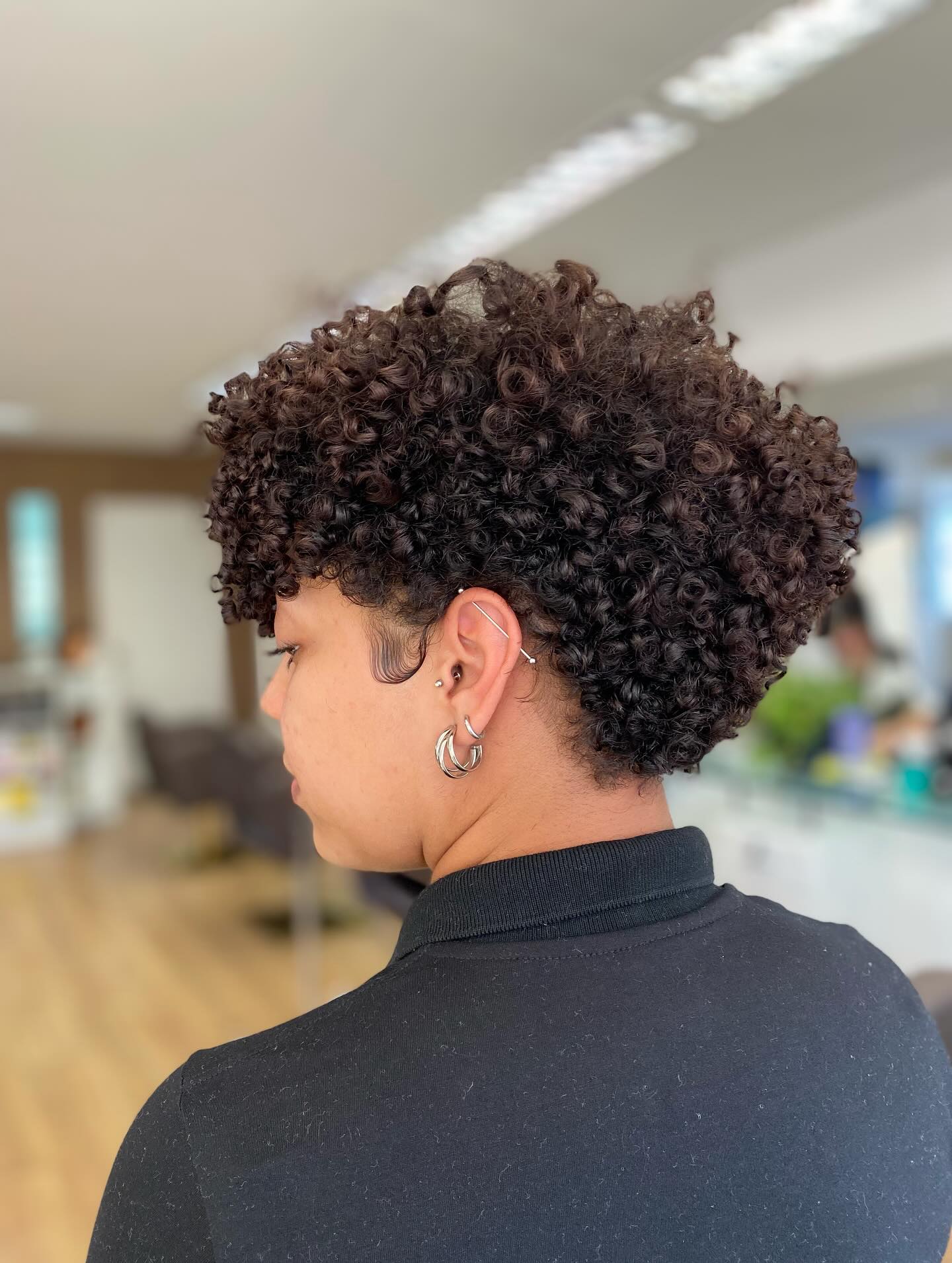 Dynamic Curly Pixie with Sculpted Curls