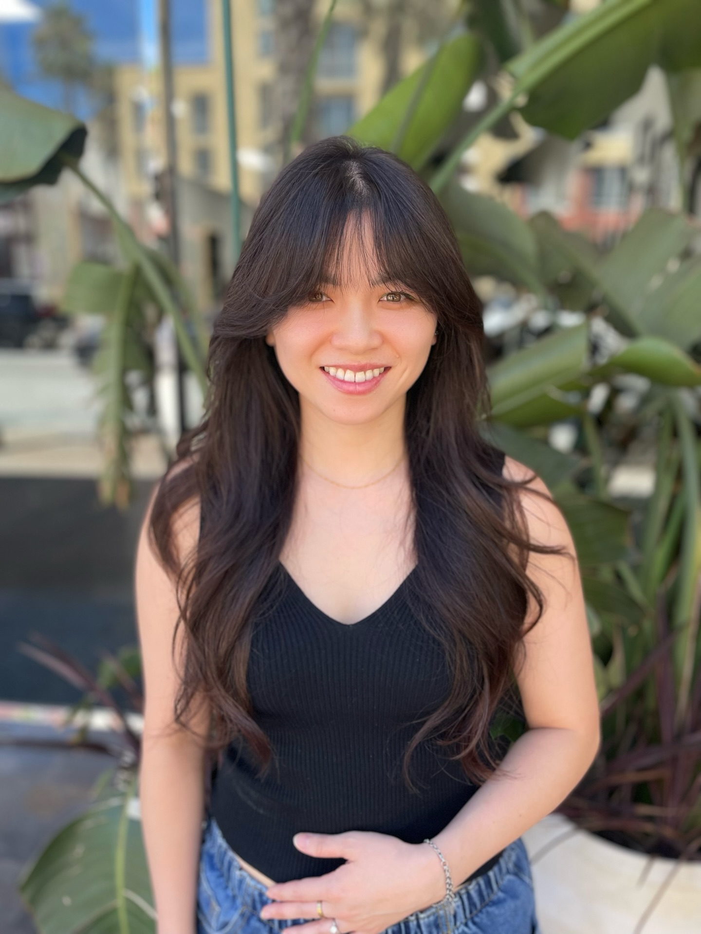 Long Layered Cut with Soft Face-Framing Bangs