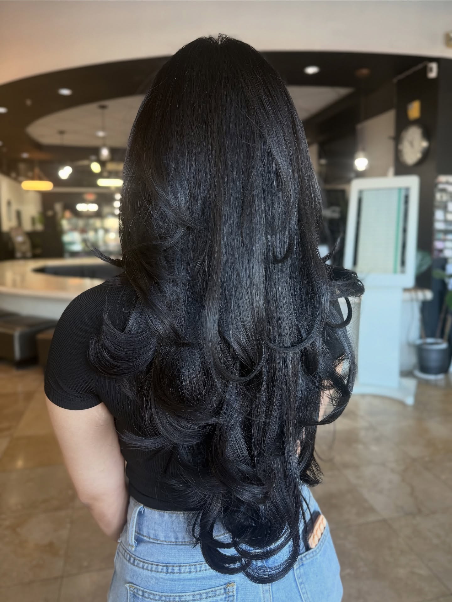 Luxurious Long Layered Cut with Soft Curls