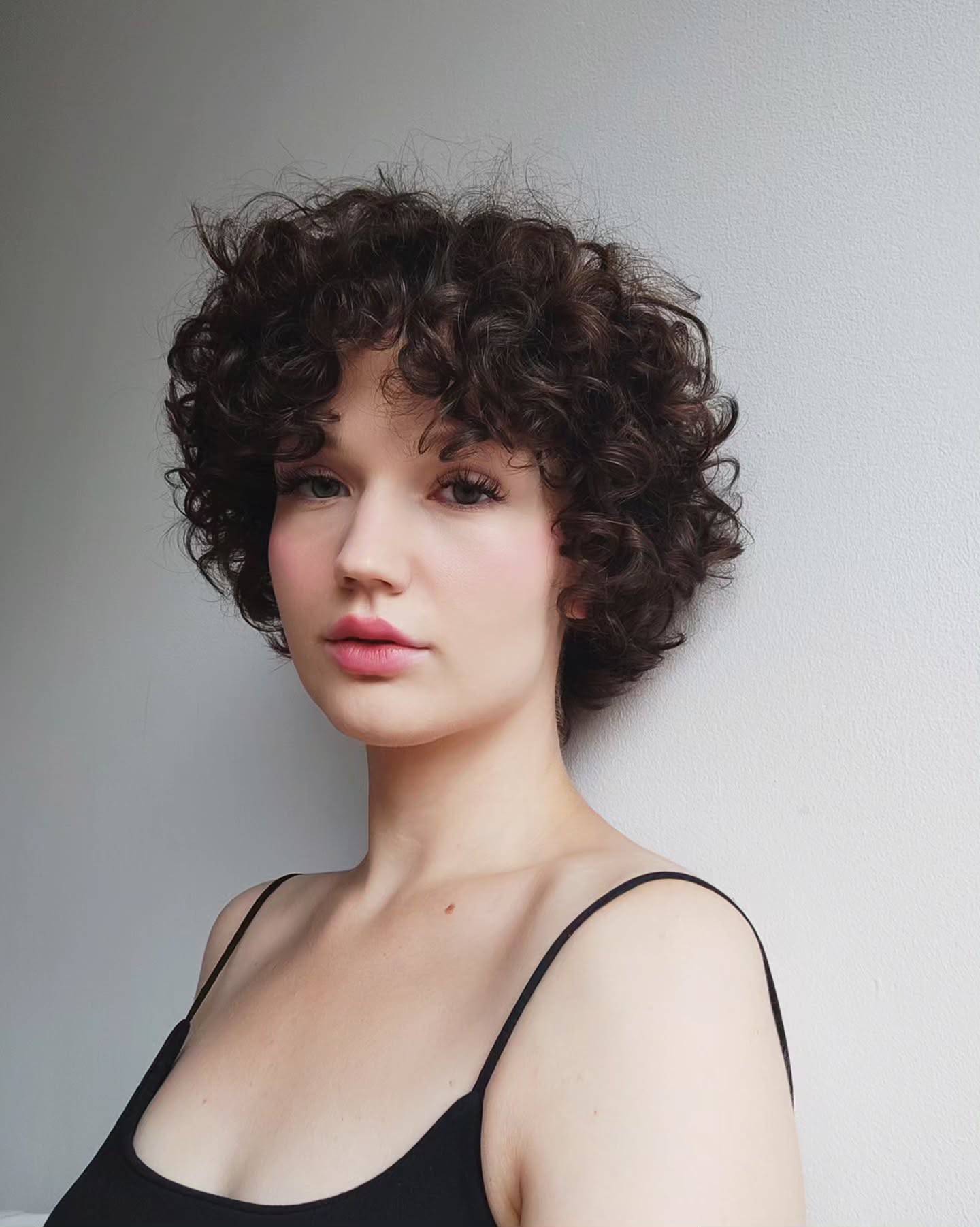 Modern Curly Pixie with Defined Volume