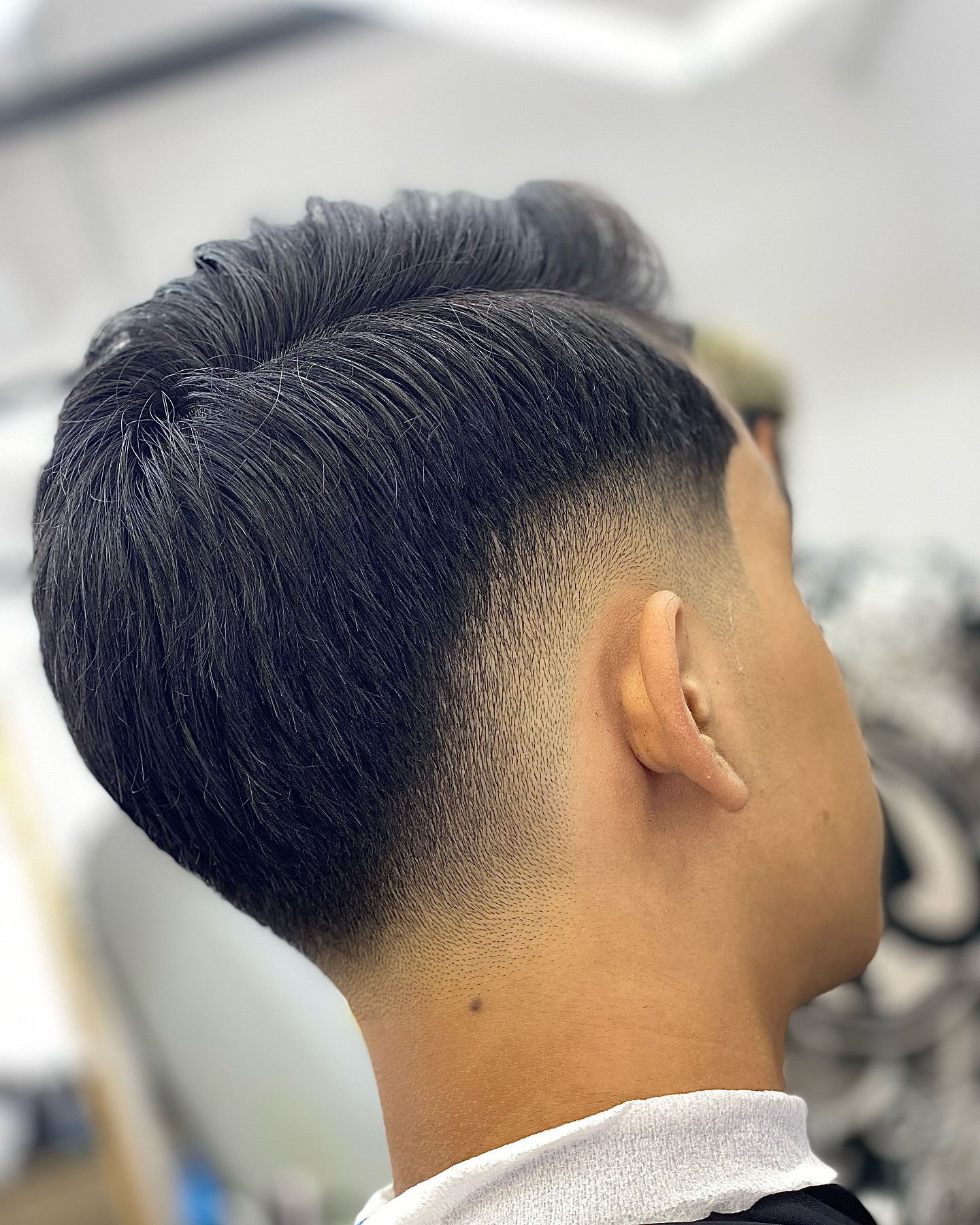 Sleek Mid Drop Fade with Textured Top