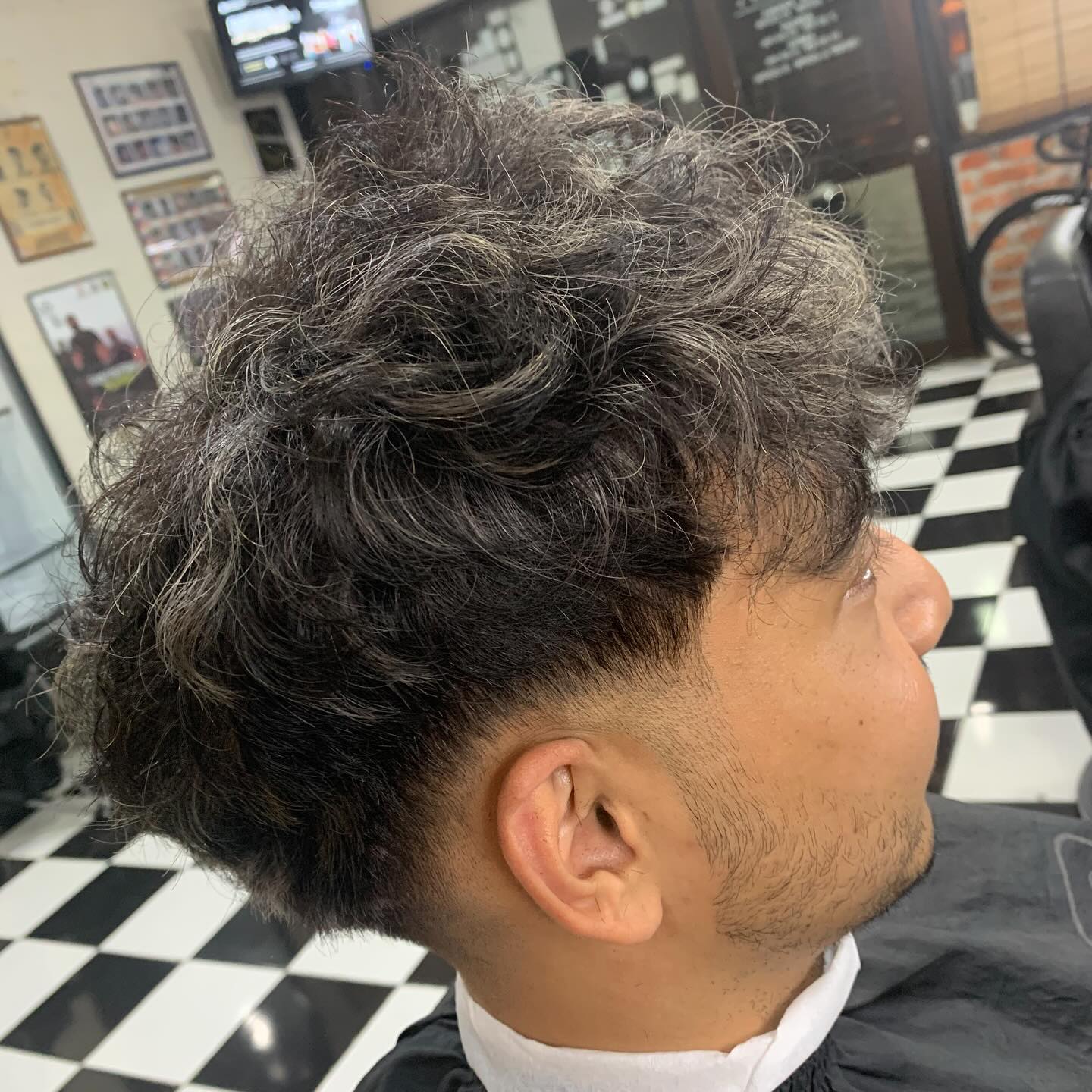 Textured Mid Drop Fade with Soft Curls