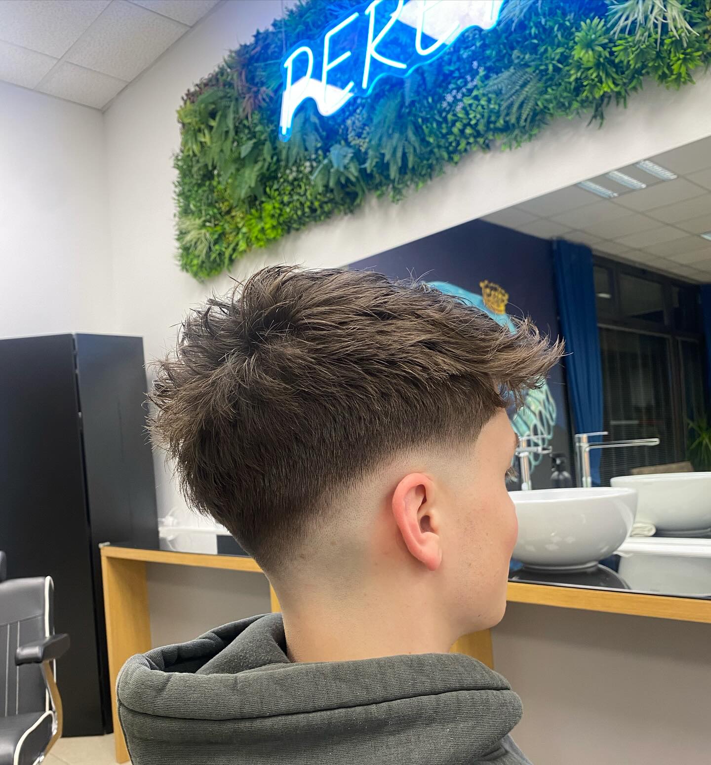 Trendy Textured Mid Drop Fade with Natural Volume