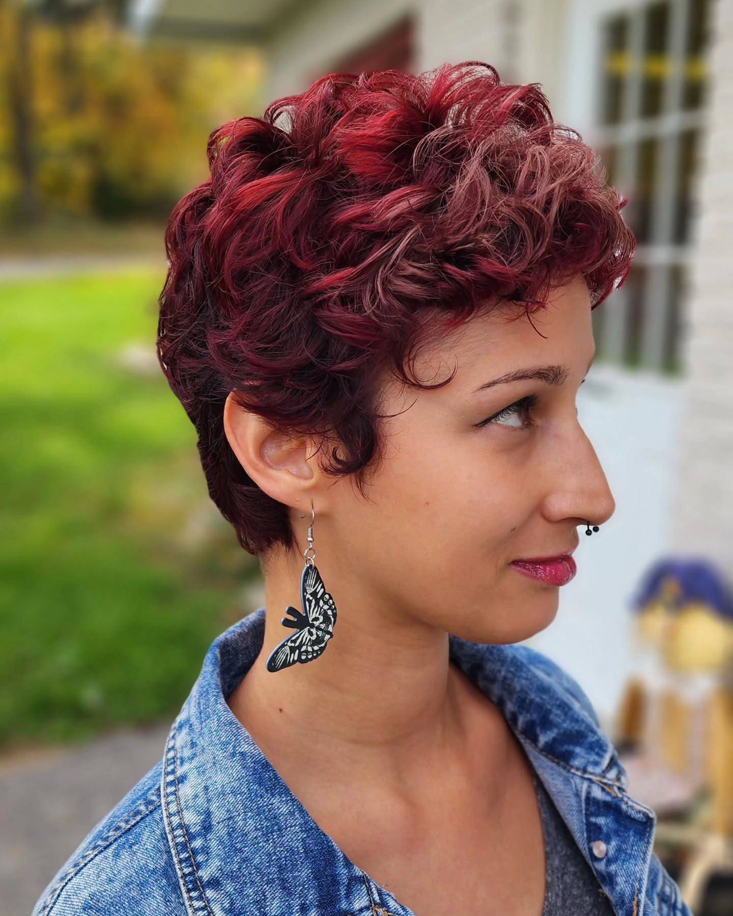 Vibrant Curly Pixie with Sun-Kissed Highlights