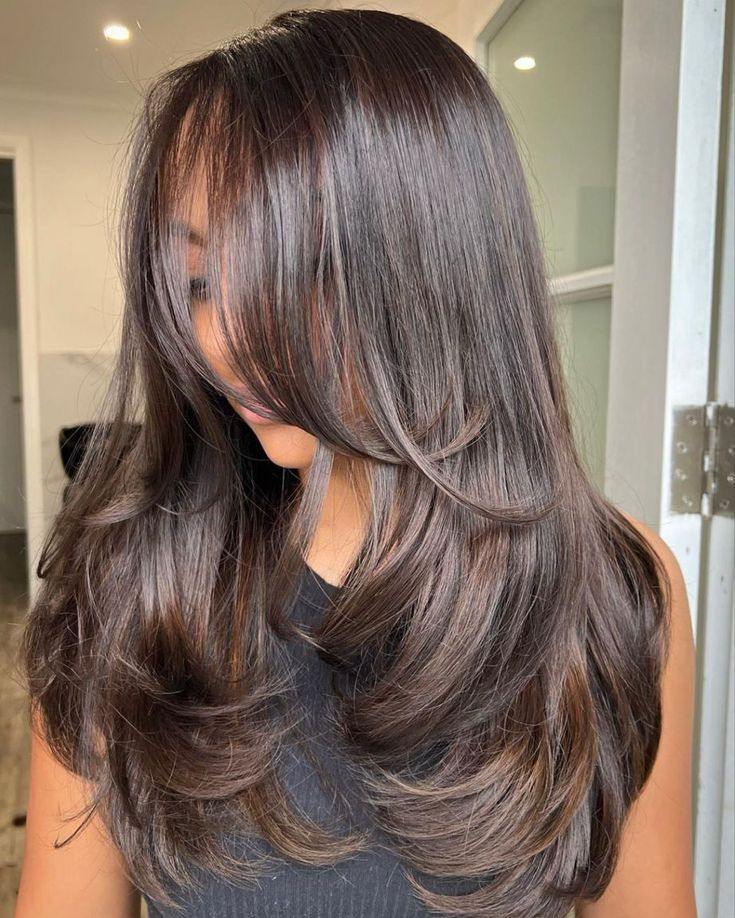 Sleek Long Layers with Subtle Movement