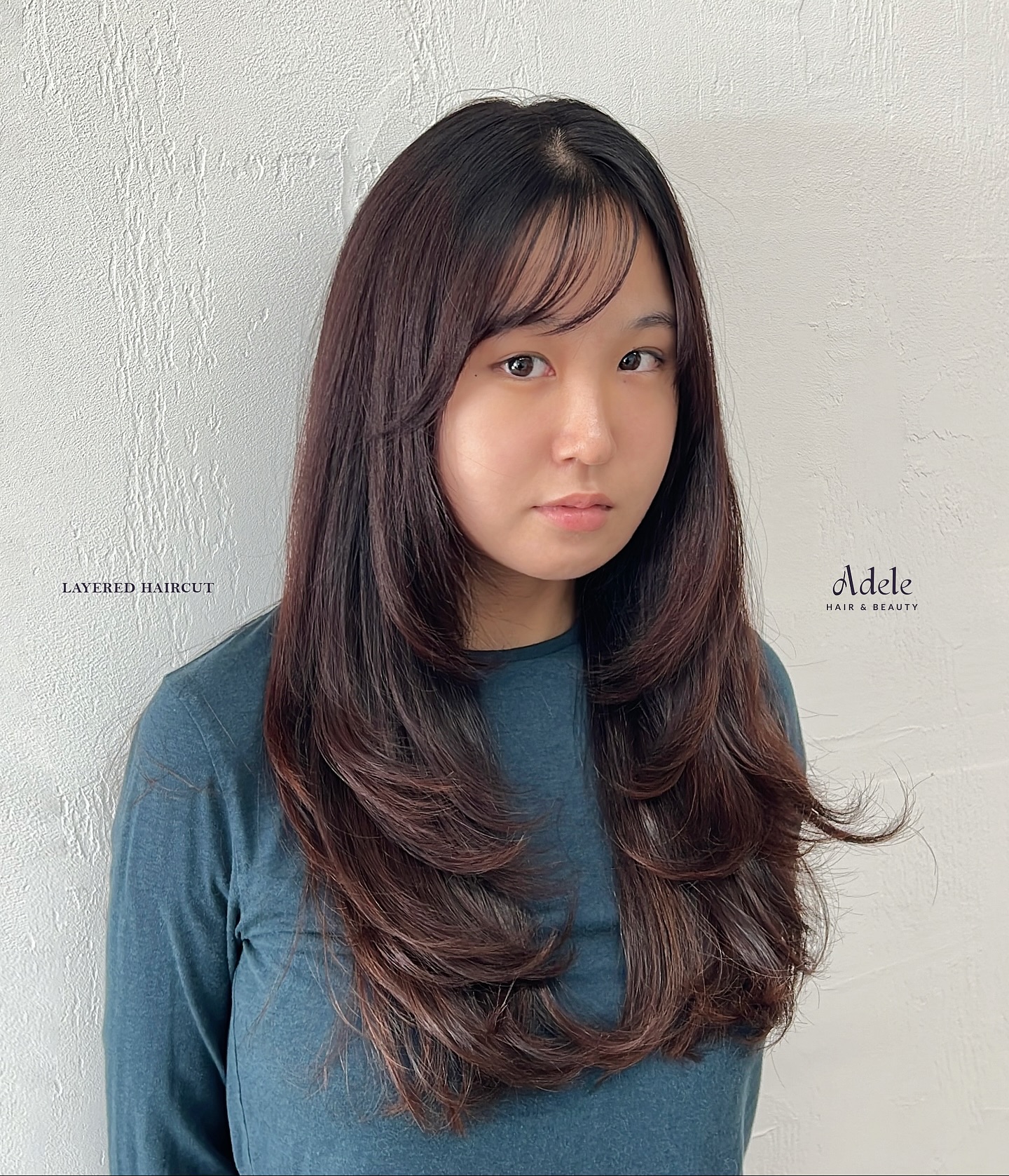 Soft Long Layers with Subtle Face-Framing Bangs