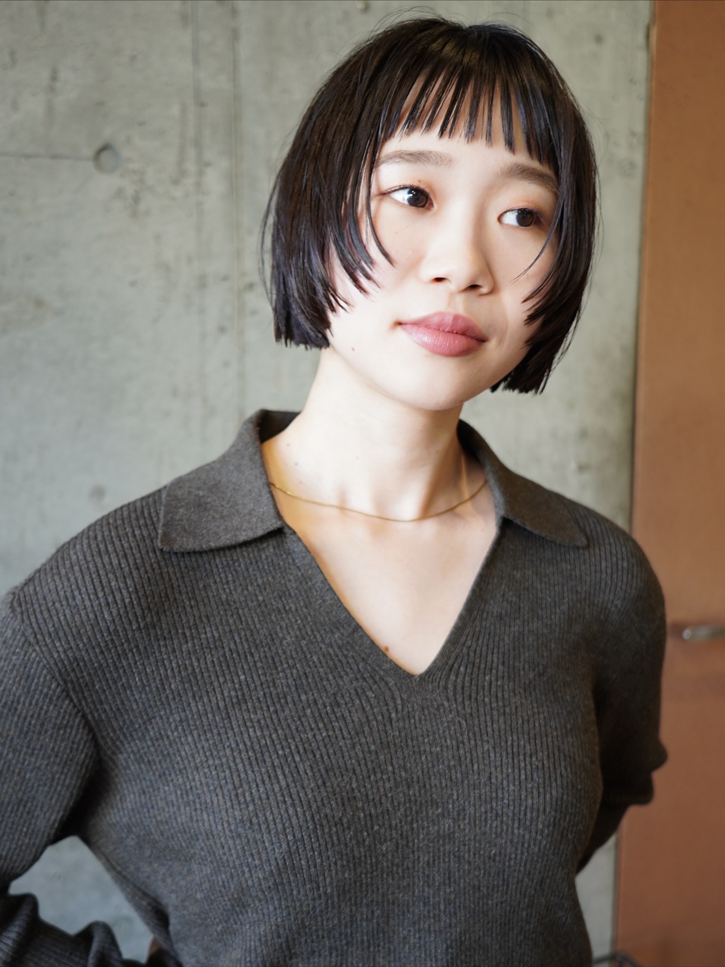 Chic Black Bob with Feathered Bangs