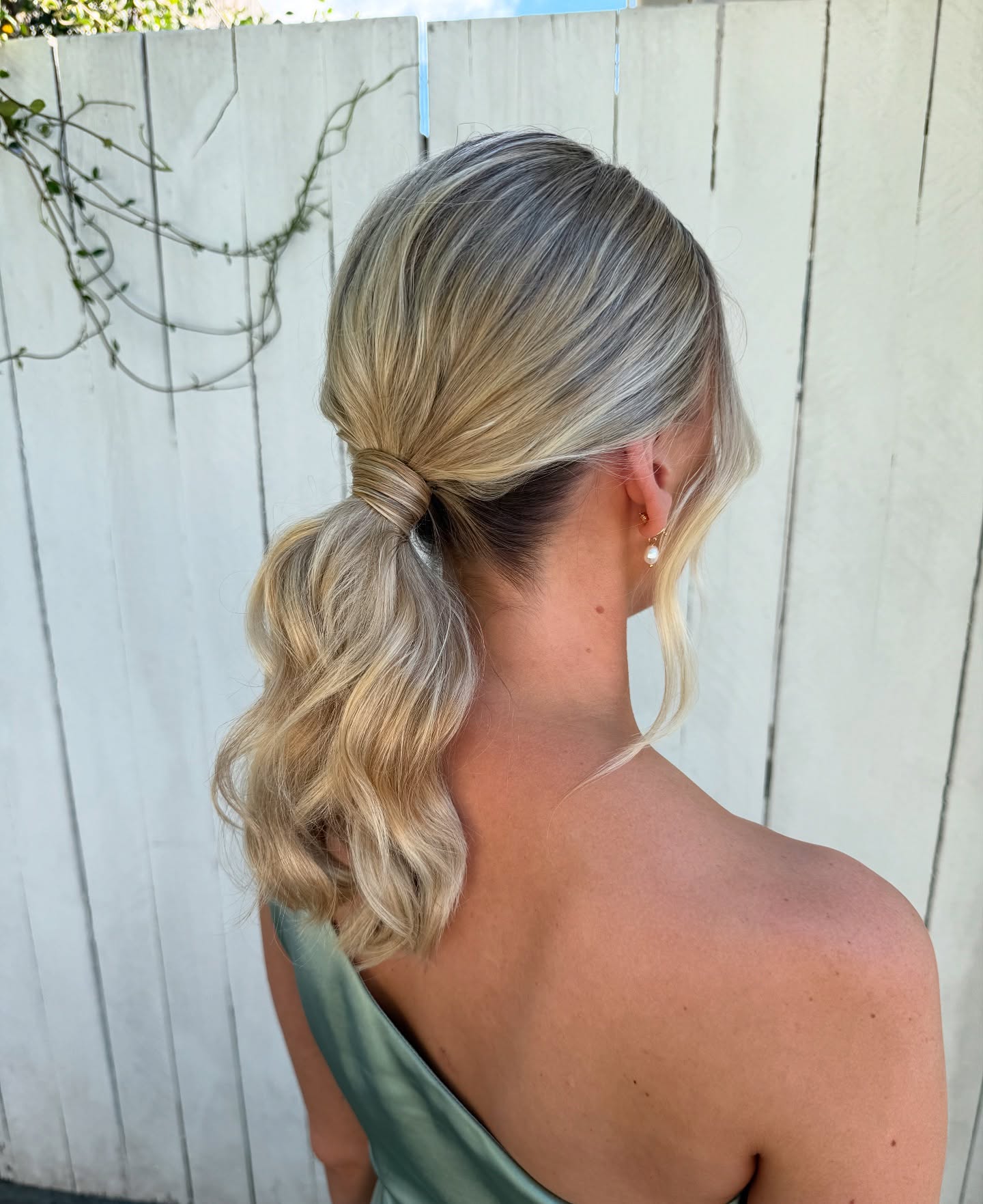 Chic Textured Low Ponytail with Soft Waves