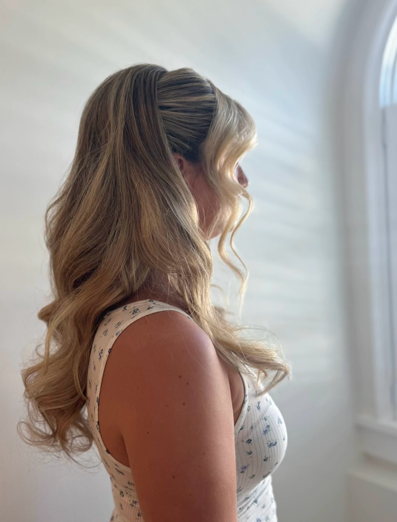 Elegant Half-Up Style with Soft Waves