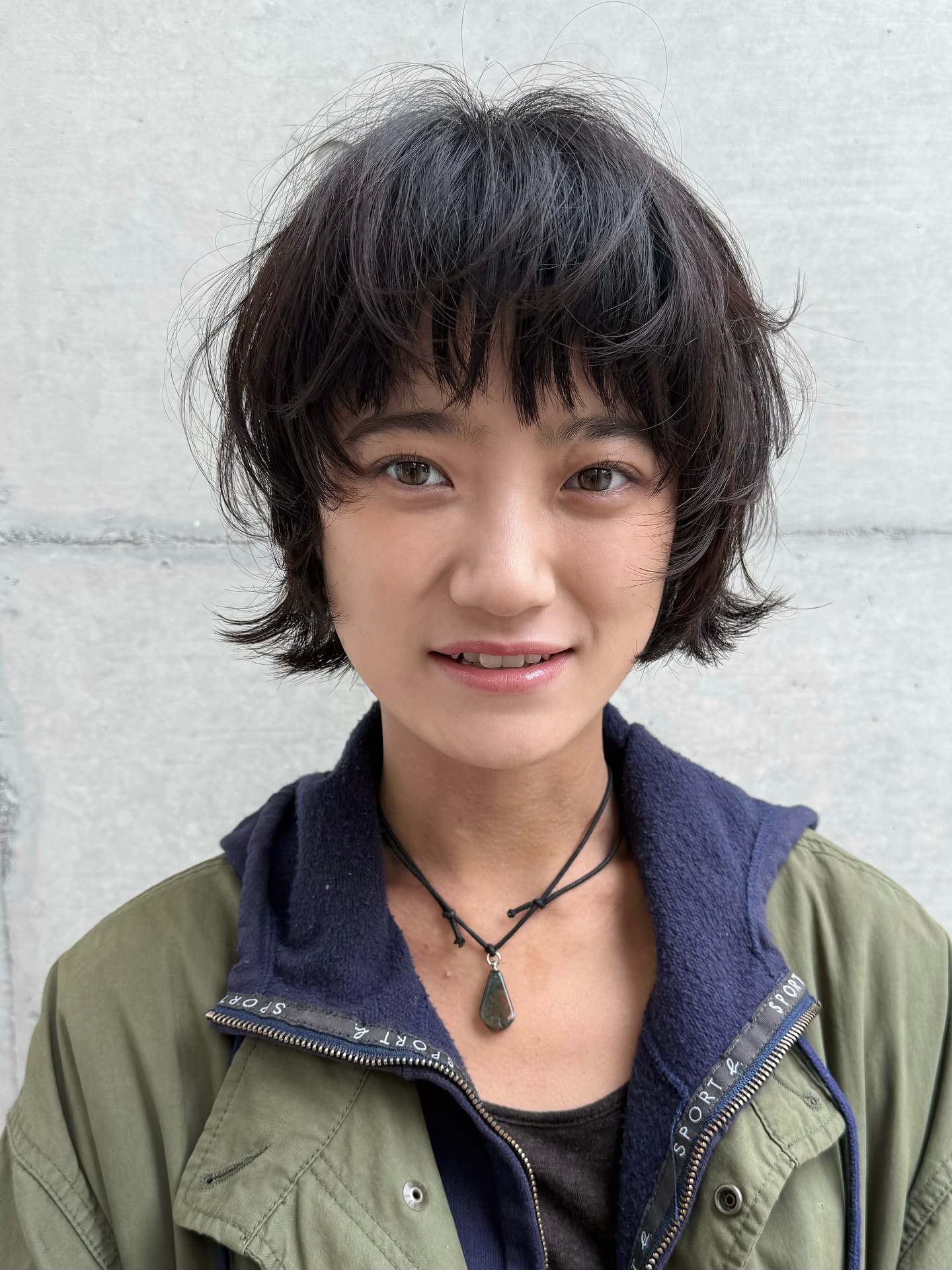 Playful Tousled Wavy Bob with Fringed Bangs